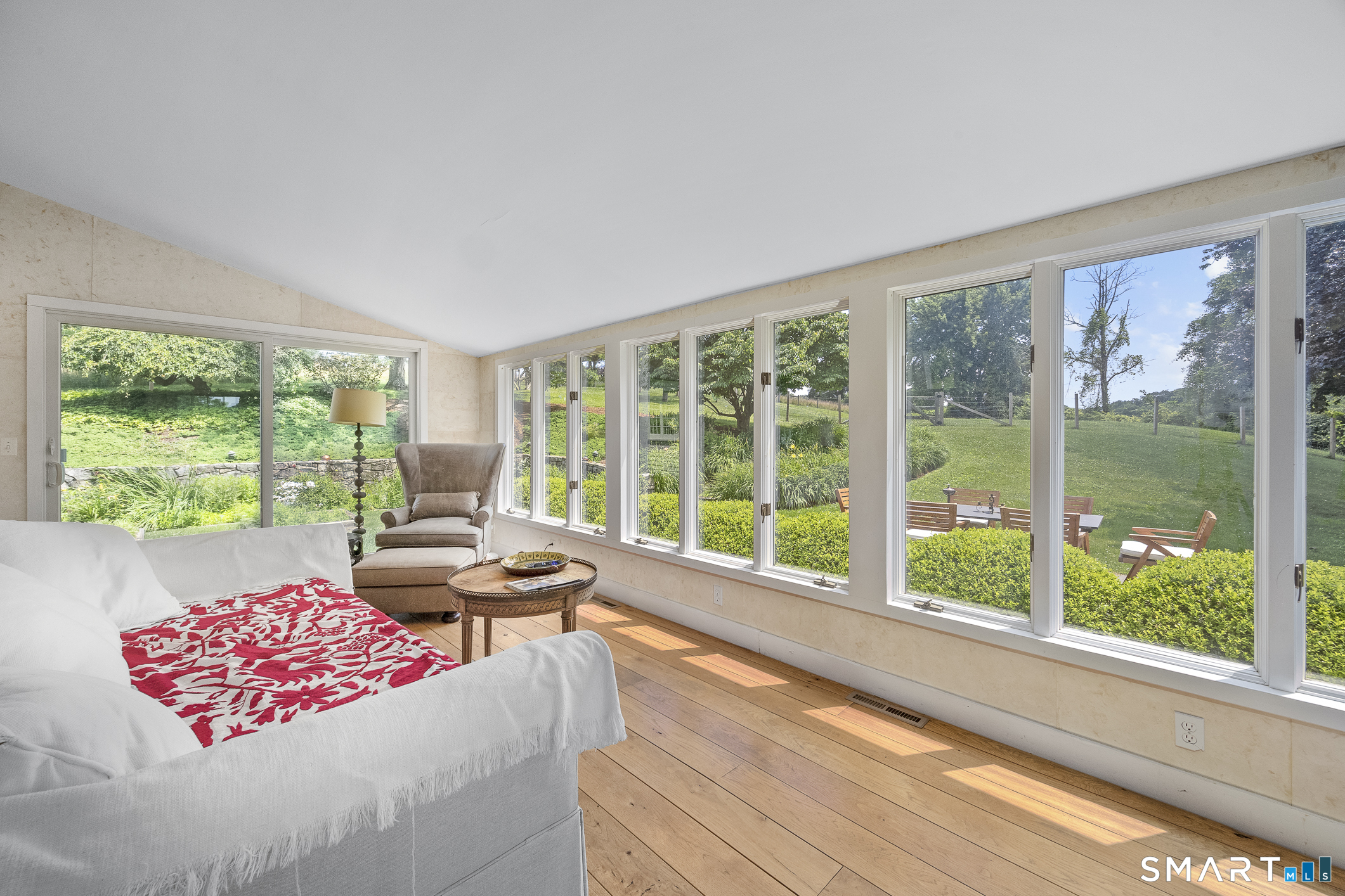50 Warner Road Bridgewater, CT 06752 - Photo 18 of 27 a living room with furniture and large windows