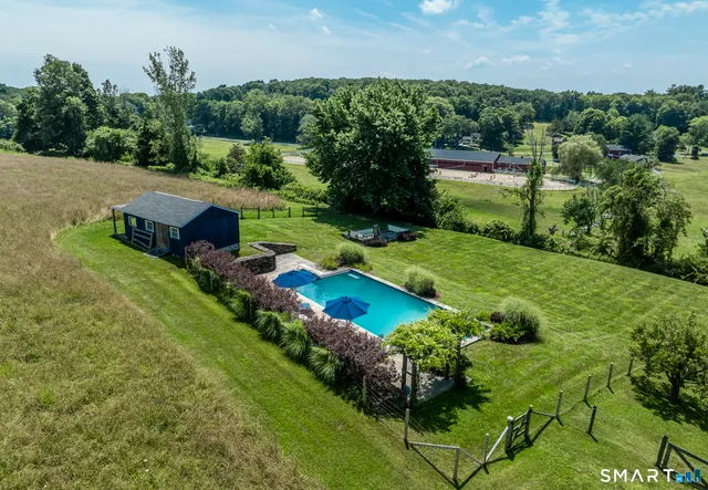 an aerial view of a house with garden