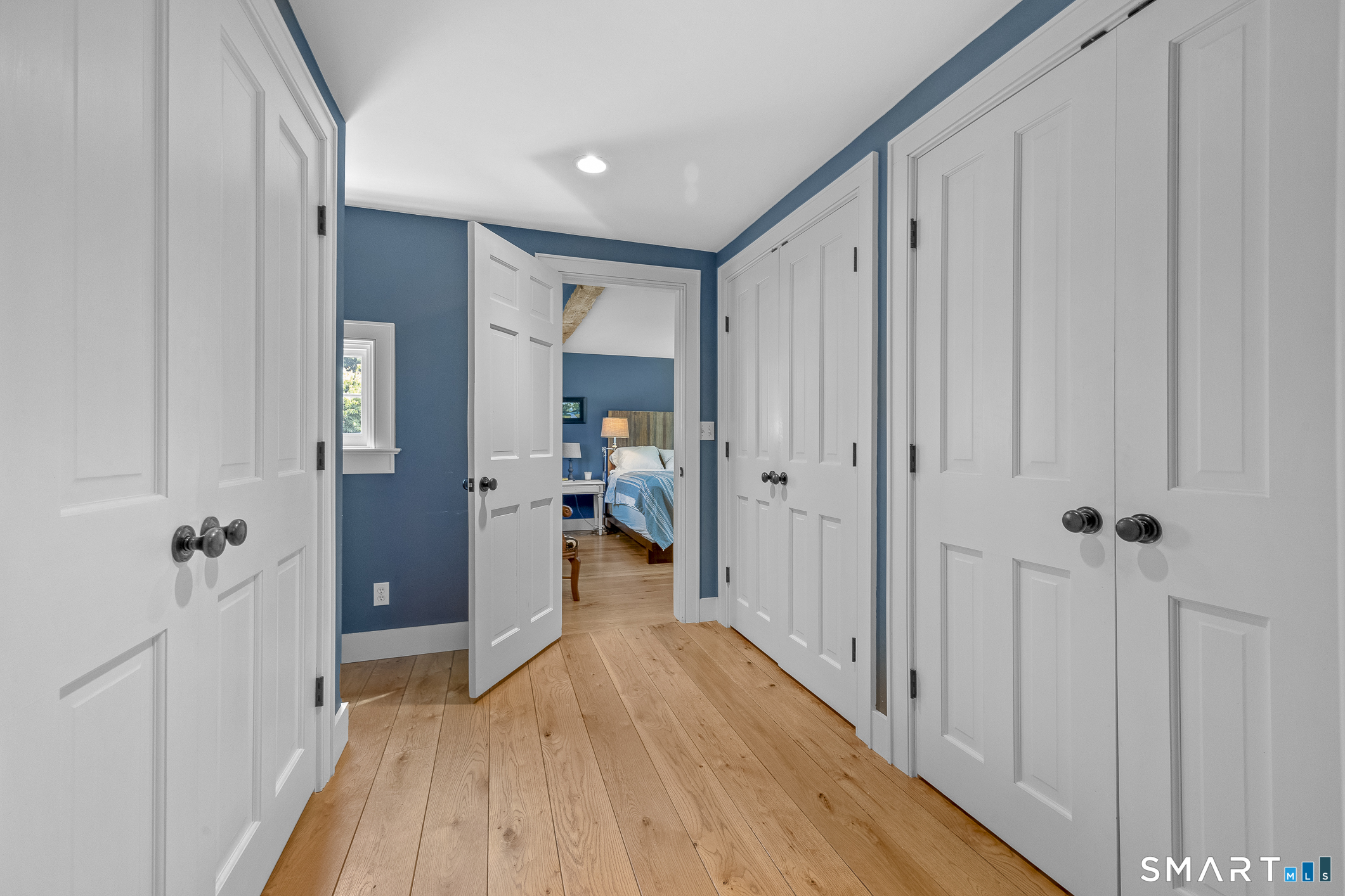 50 Warner Road Bridgewater, CT 06752 - Photo 22 of 27 a view of a hallway with closet and wooden floor