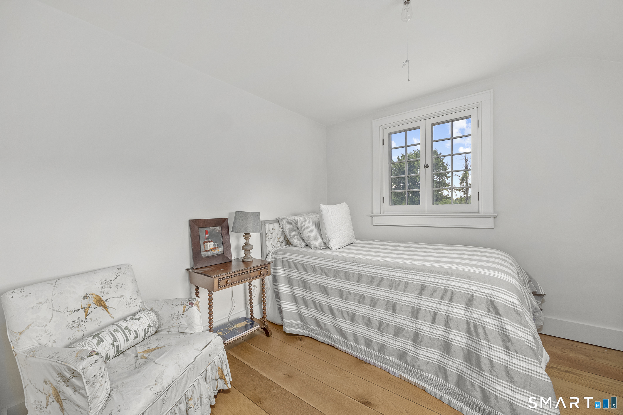 50 Warner Road Bridgewater, CT 06752 - Photo 24 of 27 a bedroom with a bed and a window