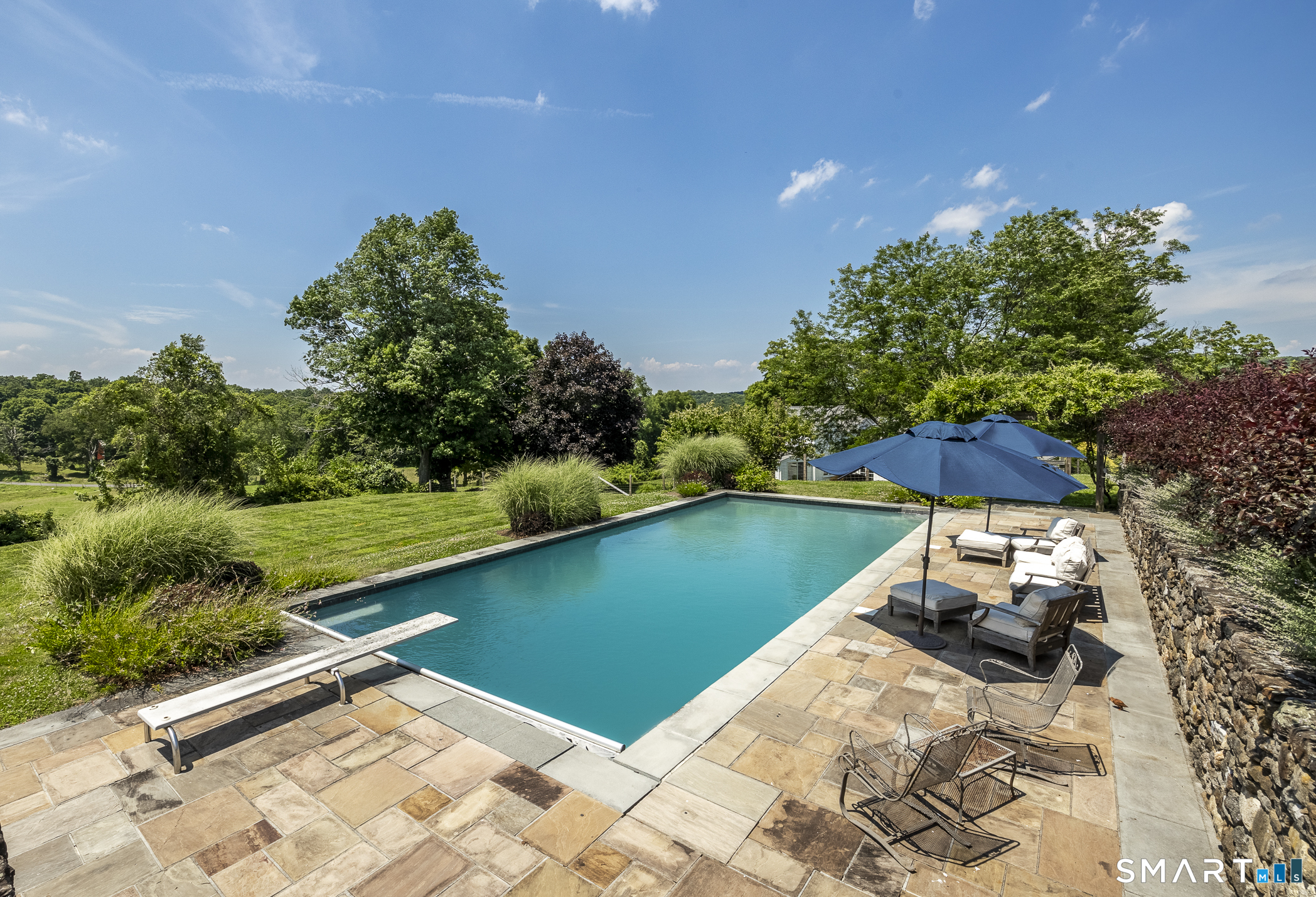 50 Warner Road Bridgewater, CT 06752 - Photo 27 of 27 a backyard of a house with lots of green space