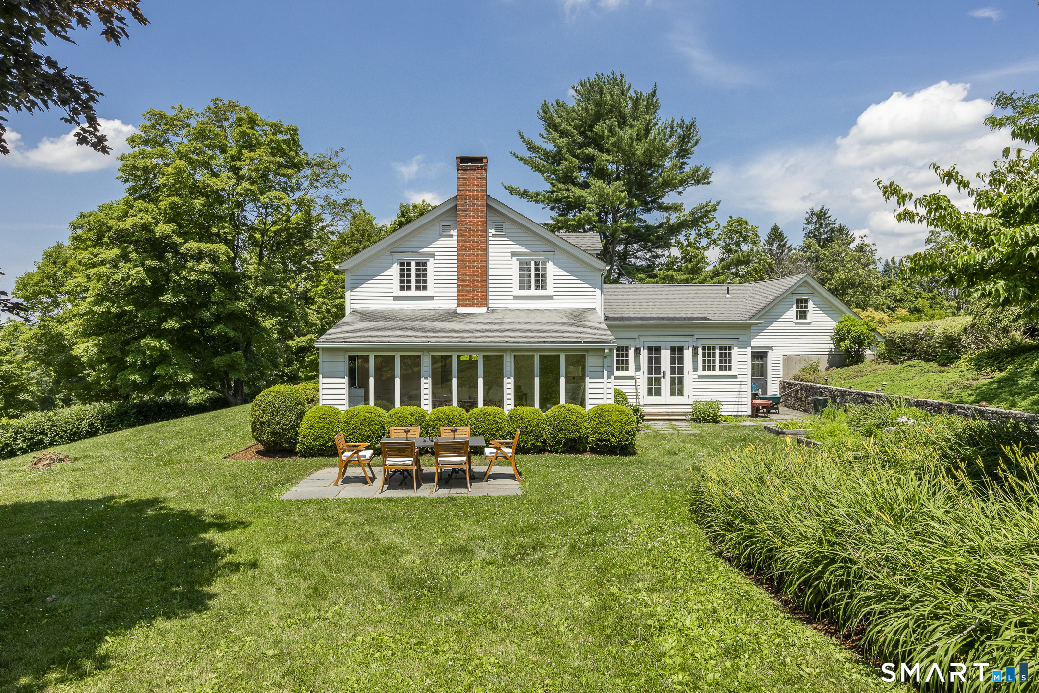 50 Warner Road Bridgewater, CT 06752 - Photo 3 of 27 a front view of a house with garden