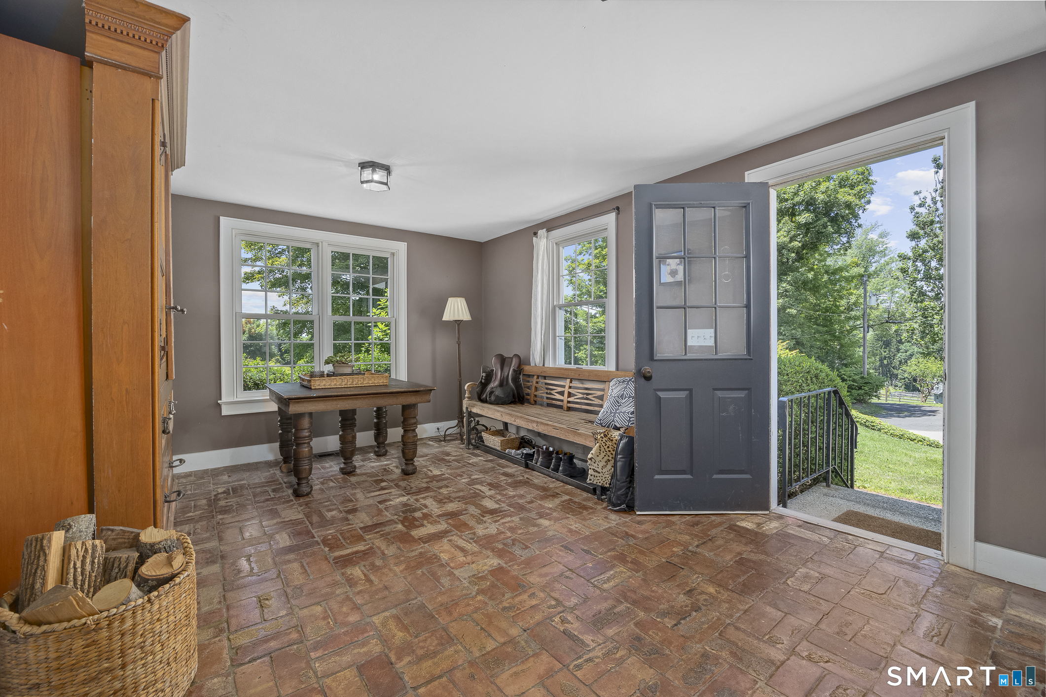 50 Warner Road Bridgewater, CT 06752 - Photo 7 of 27 a living room with furniture a window and a table