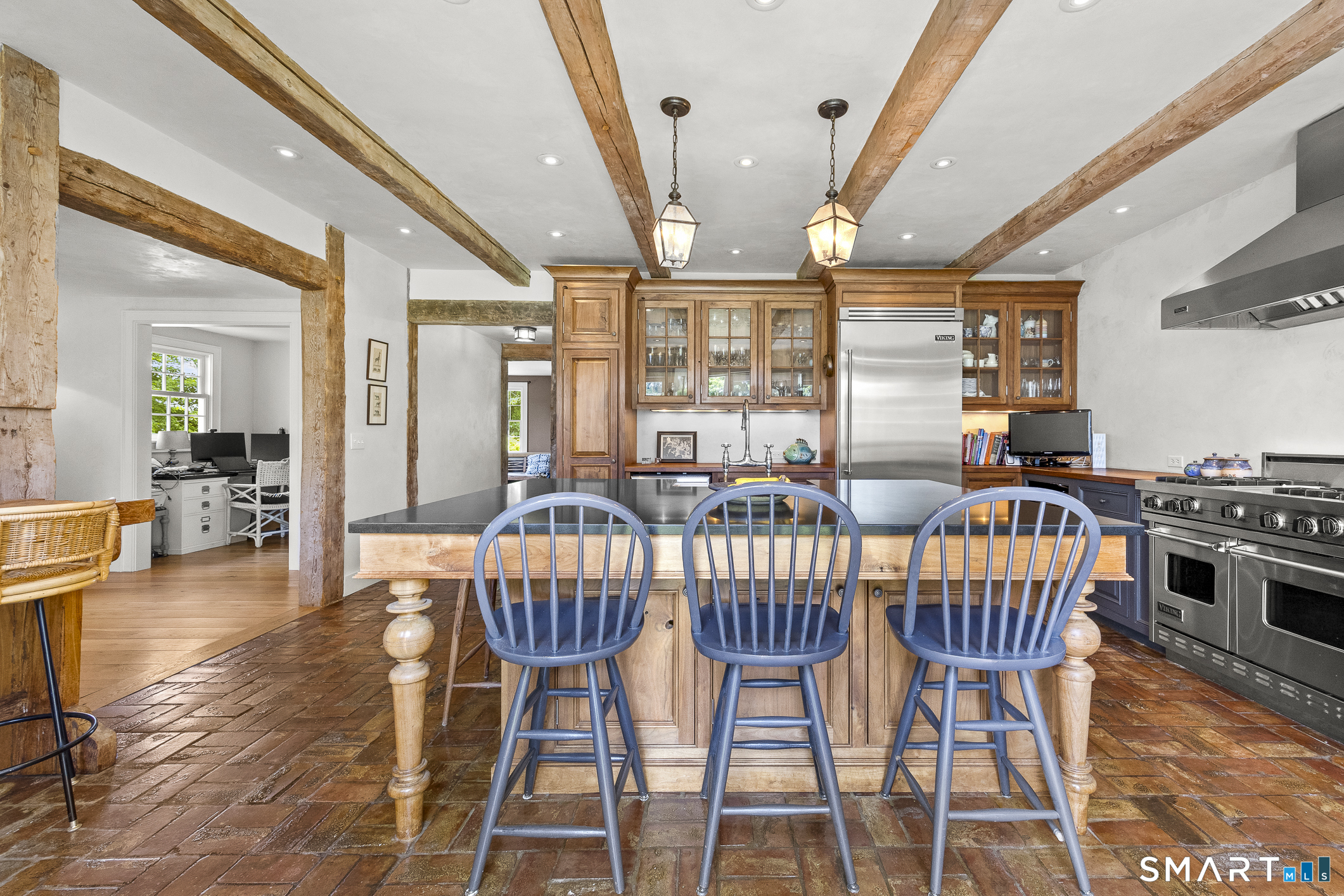 50 Warner Road Bridgewater, CT 06752 - Photo 10 of 27 a dining room with furniture a chandelier and wooden floor
