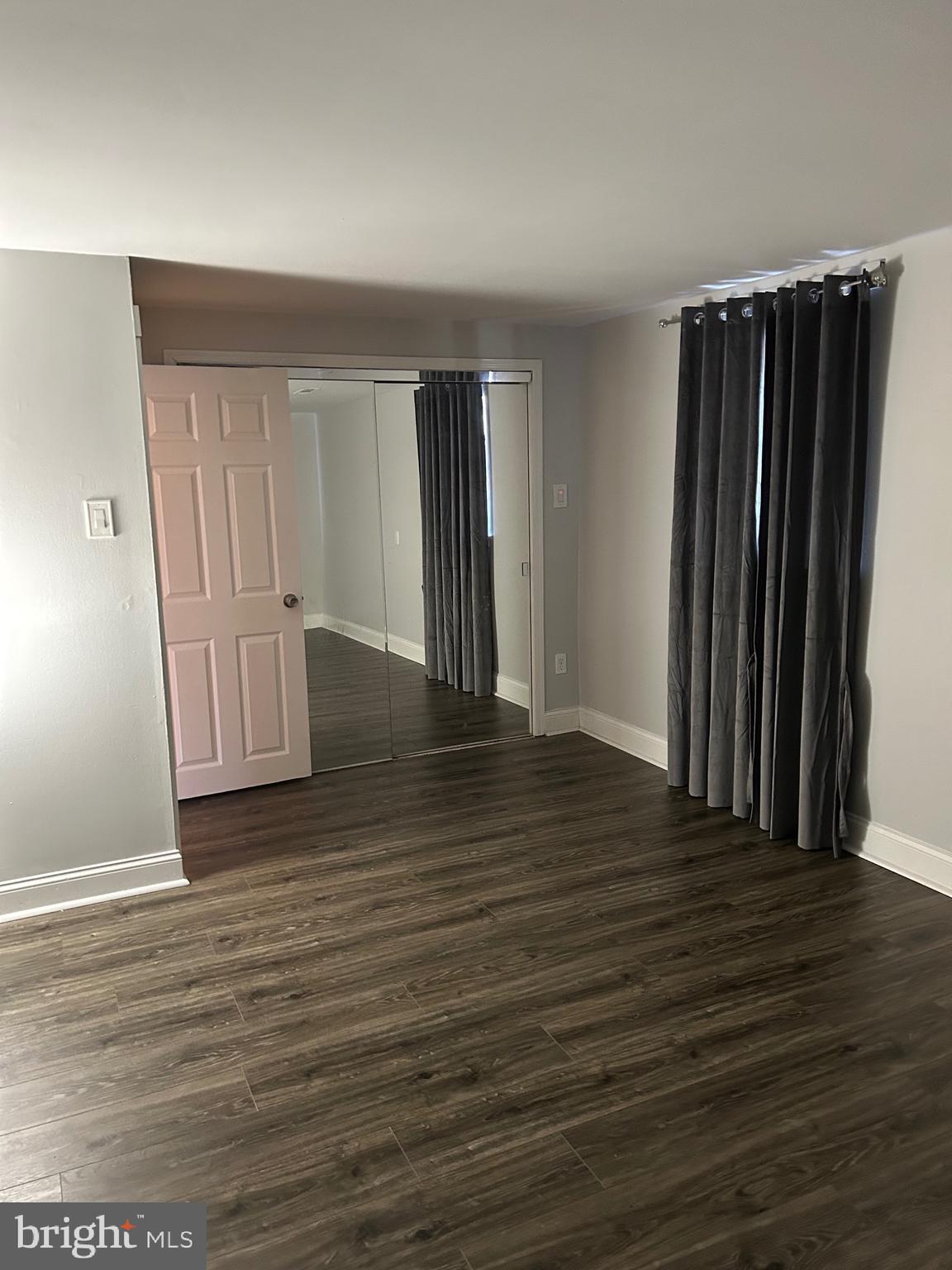 240 Purdue Avenue Pemberton, NJ 08068 - Photo 23 of 27 an empty room with wooden floor and closet area