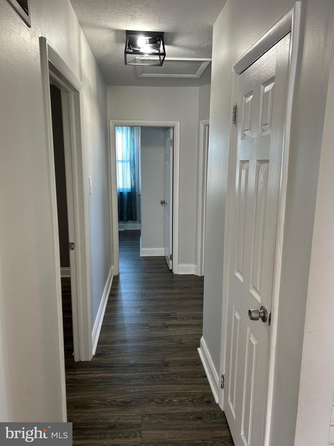 240 Purdue Avenue Pemberton, NJ 08068 - Photo 8 of 27 a view of a hallway with wooden floor