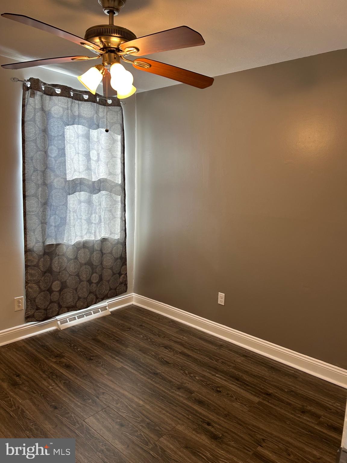 240 Purdue Avenue Pemberton, NJ 08068 - Photo 10 of 27 en empty room with wooden floor and fan