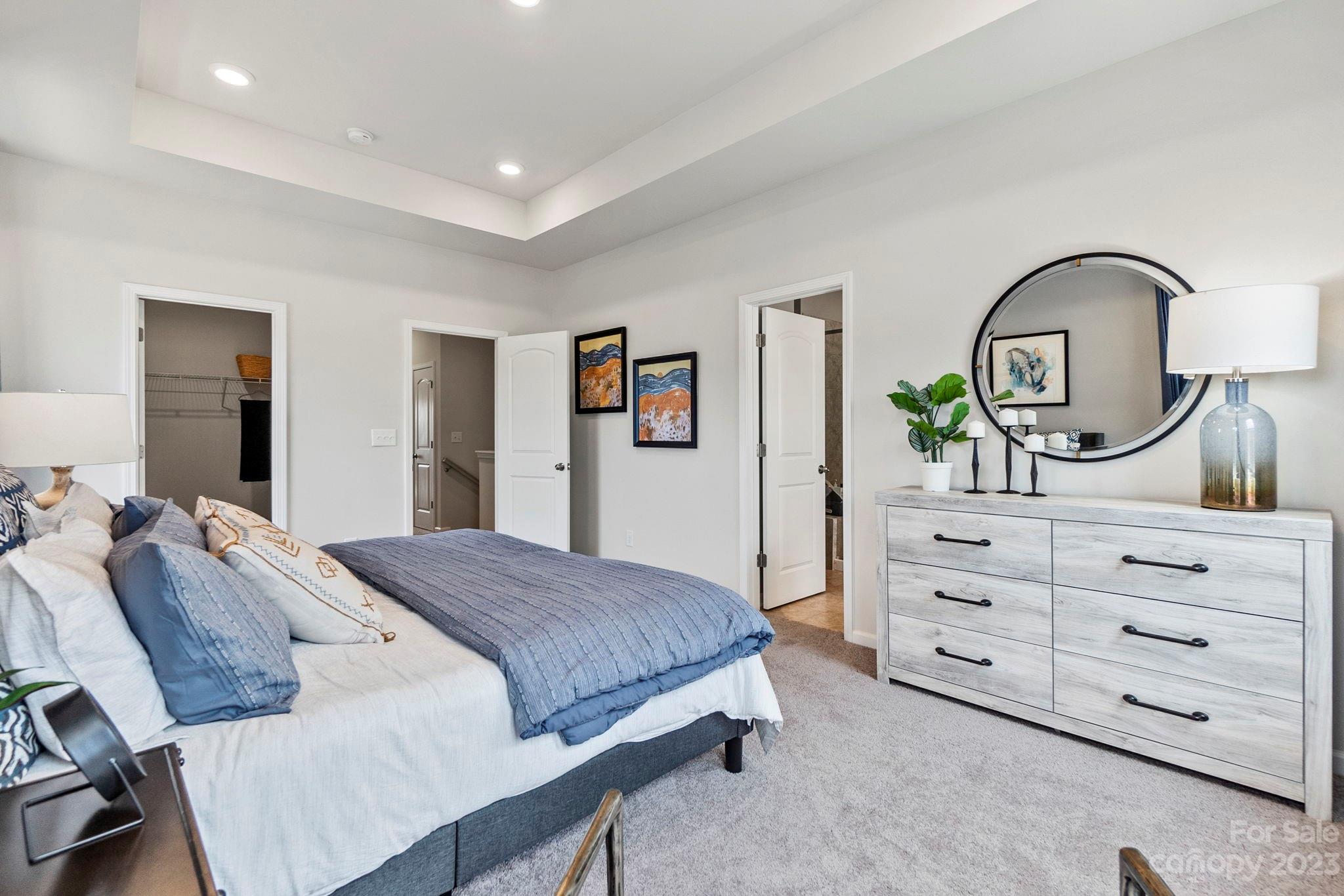 7856 Nelson Road Mint Hill, NC 28227 - Photo 13 of 30 a bedroom with a bed and a dresser