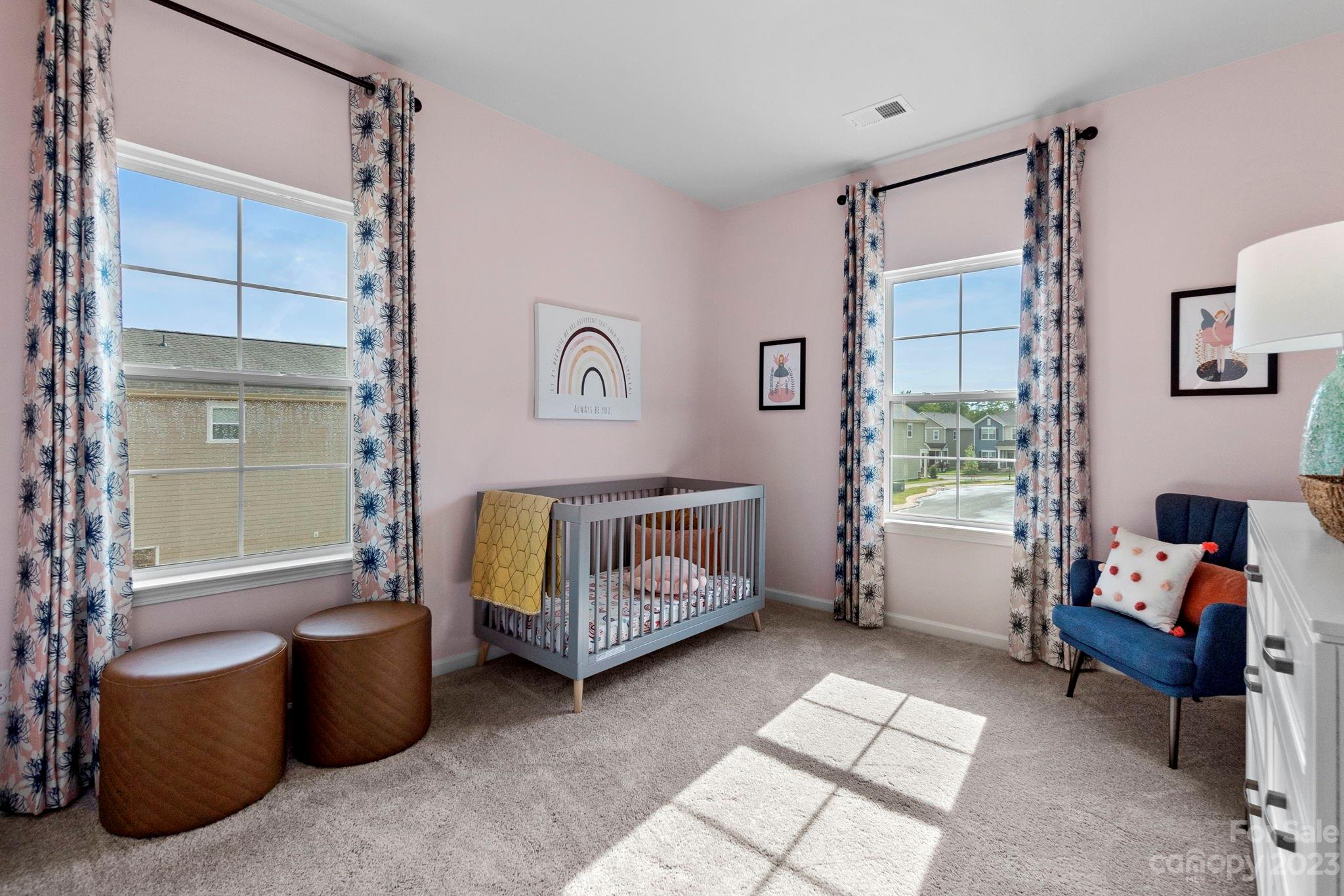 7856 Nelson Road Mint Hill, NC 28227 - Photo 19 of 30 a bedroom with furniture and a window