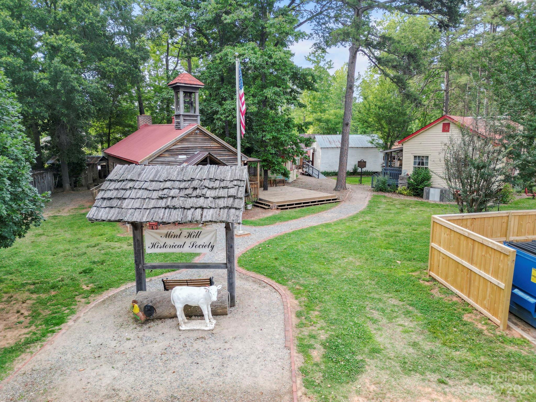 7856 Nelson Road Mint Hill, NC 28227 - Photo 24 of 30 a view of a house with backyard and a sitting area
