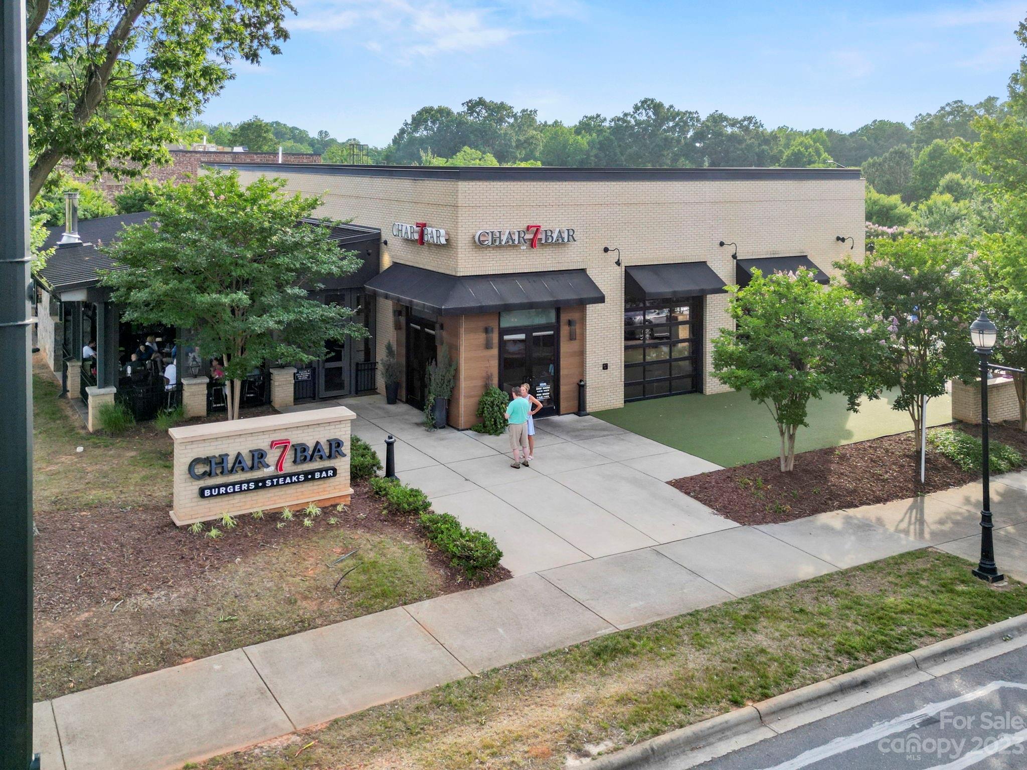 7856 Nelson Road Mint Hill, NC 28227 - Photo 27 of 30 a view of house with outdoor space and sitting area