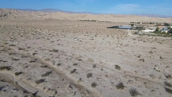 a view of beach and mountain