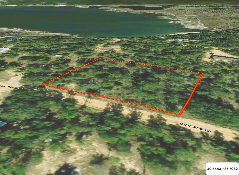 Lot C27 Stewart Lake Road Chipley, FL 32428 - Photo 1 of 11 a view of a field with an outdoor space