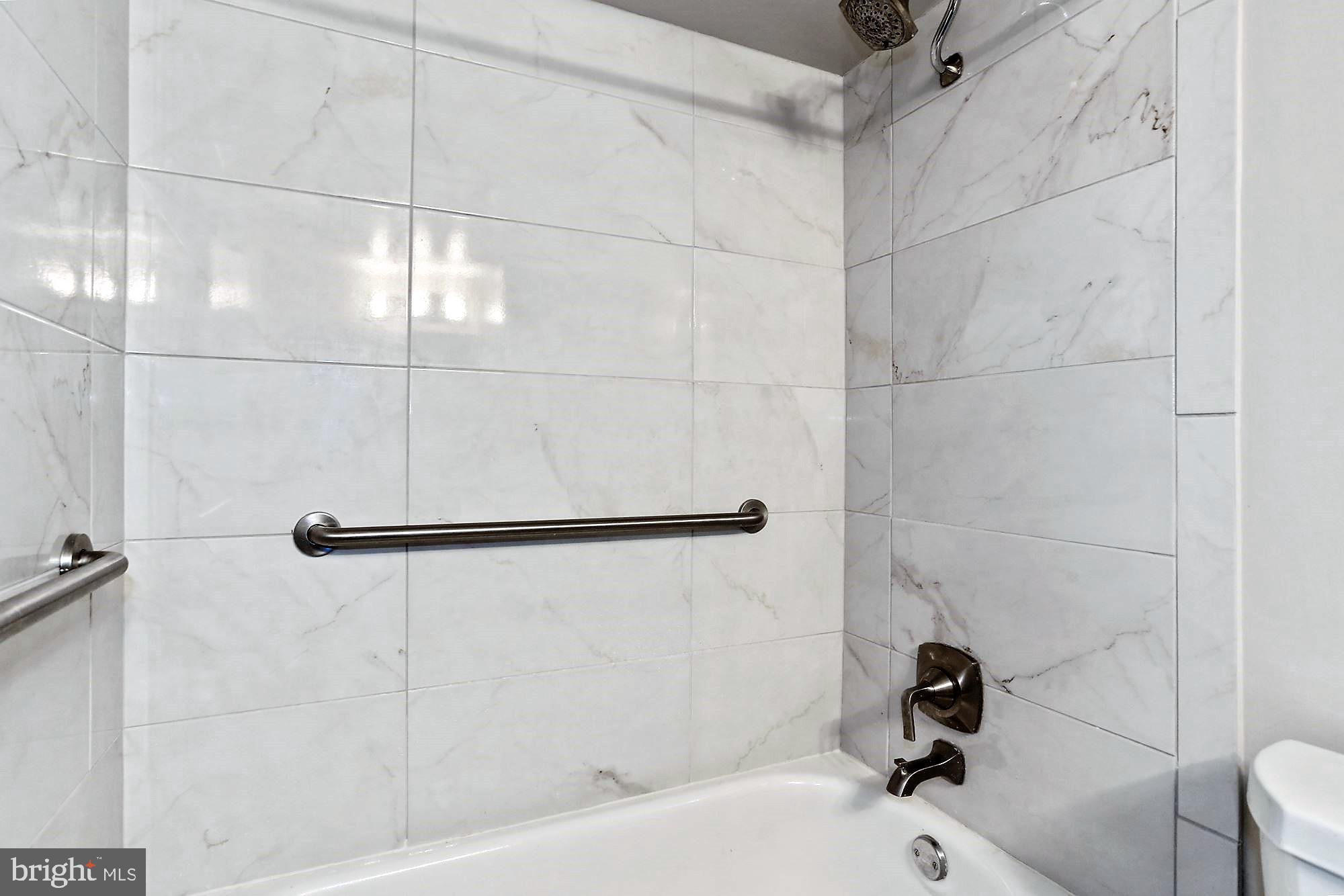 1645 Parkcrest Circle, Unit 100 Reston, VA 20190 - Photo 12 of 24 Remodeled Master tub & shower