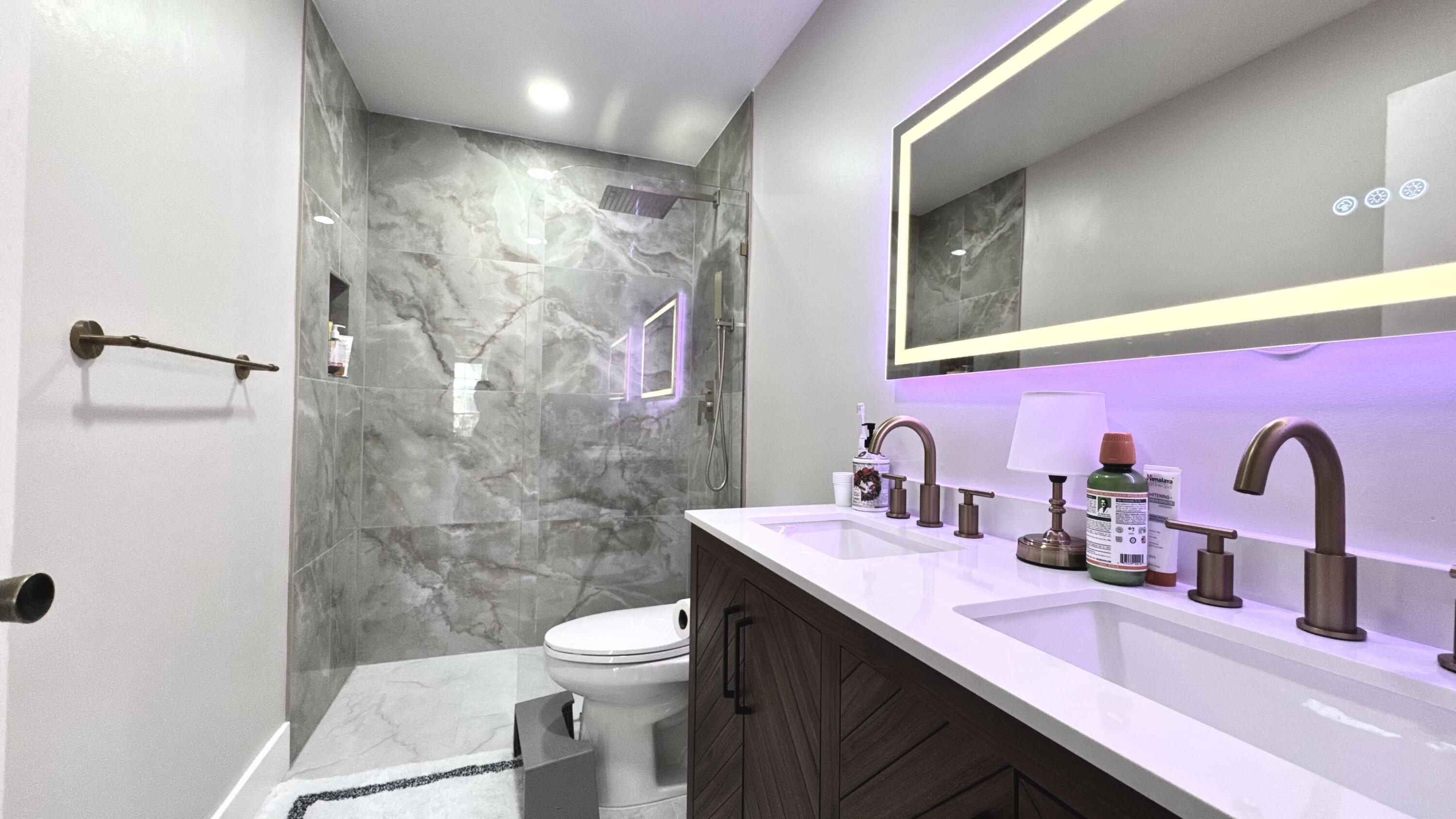 5016 Heatherhill Lane, Unit 10 Boca Raton, FL 33486 - Photo 7 of 12 Primary Bathroom