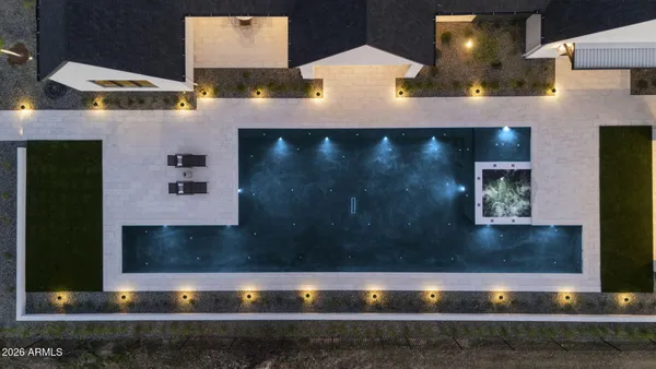 a front view of a house with swimming pool
