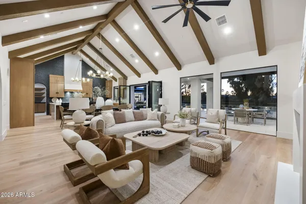 a view of a workspace with furniture and lounge chair