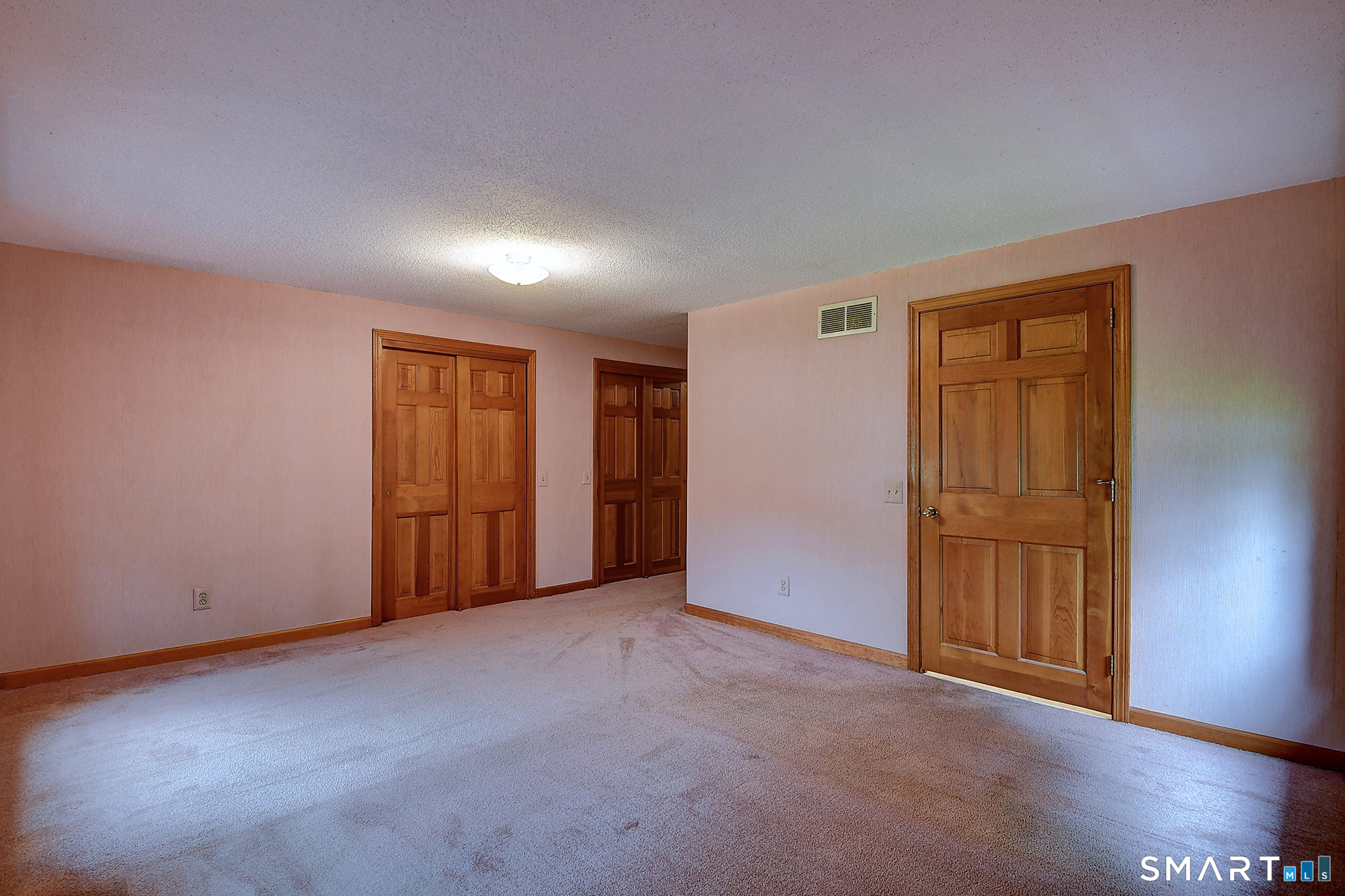 80 Grist Mill Road Wethersfield, CT 06109 - Photo 30 of 40 an empty room with closet area
