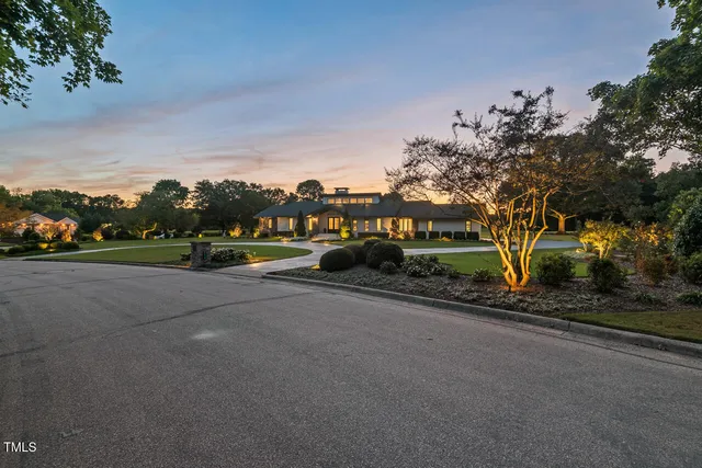 a house view with a garden space