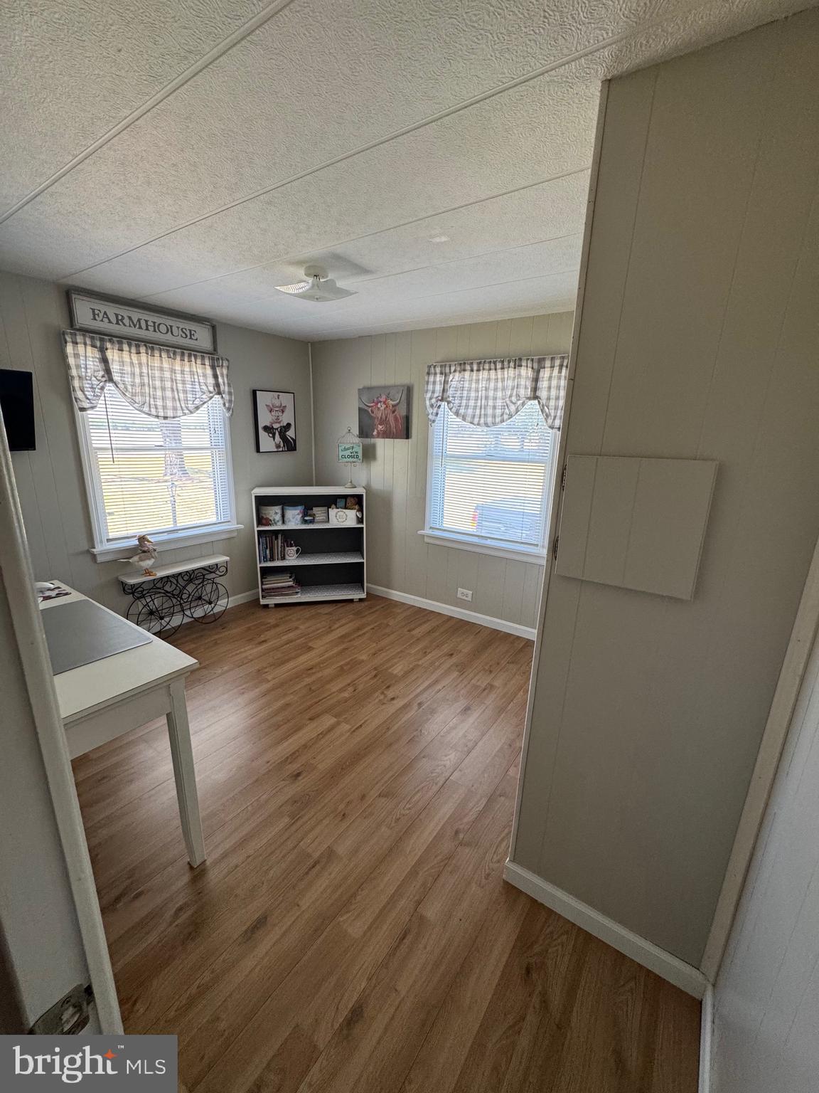 6101 Bethlehem Road Preston, MD 21655 - Photo 18 of 36 a view of a livingroom with furniture wooden floor and window