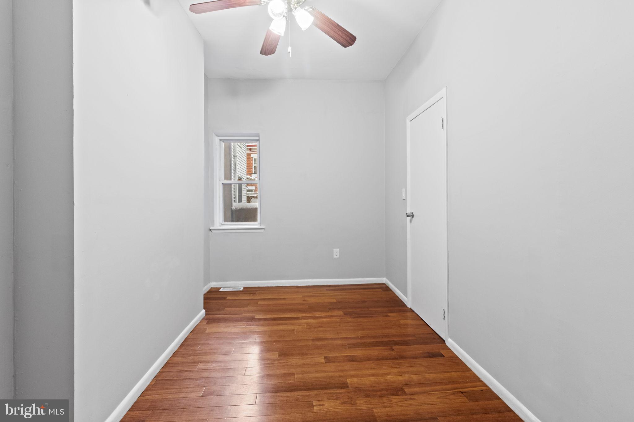 728 Christian Street, Unit 1 Philadelphia, PA 19147 - Photo 14 of 25 a view of a hallway with wooden floor