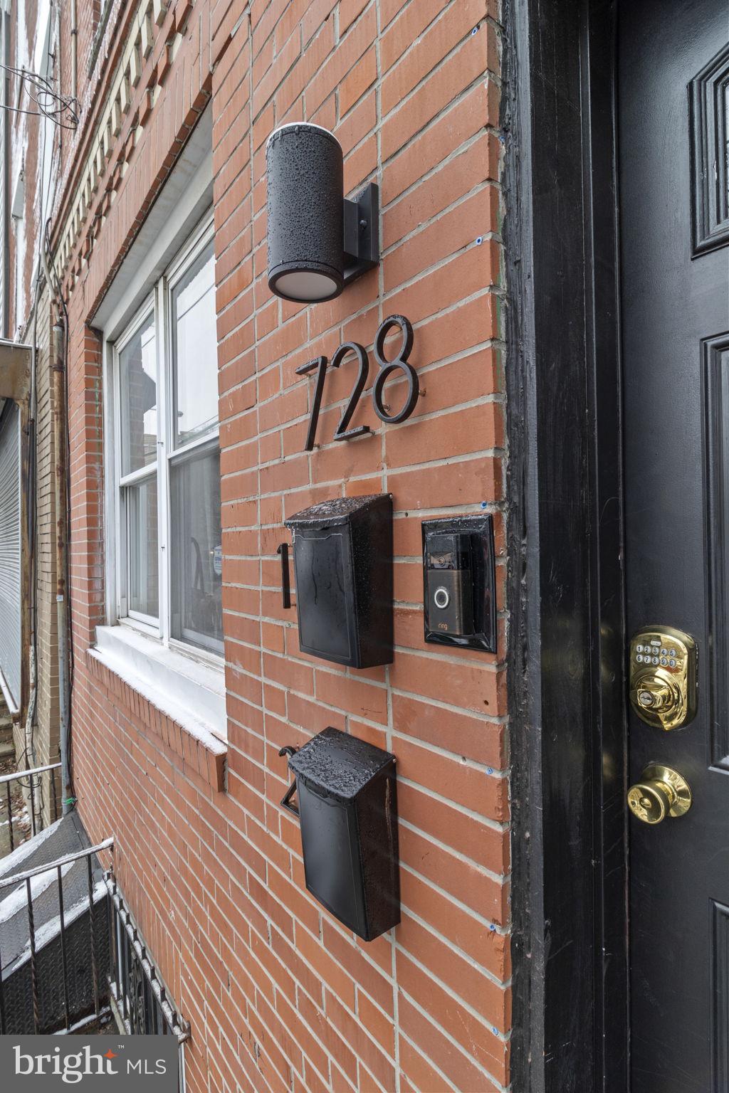728 Christian Street, Unit 1 Philadelphia, PA 19147 - Photo 25 of 25 a view of a door of the house with a door and wooden floor