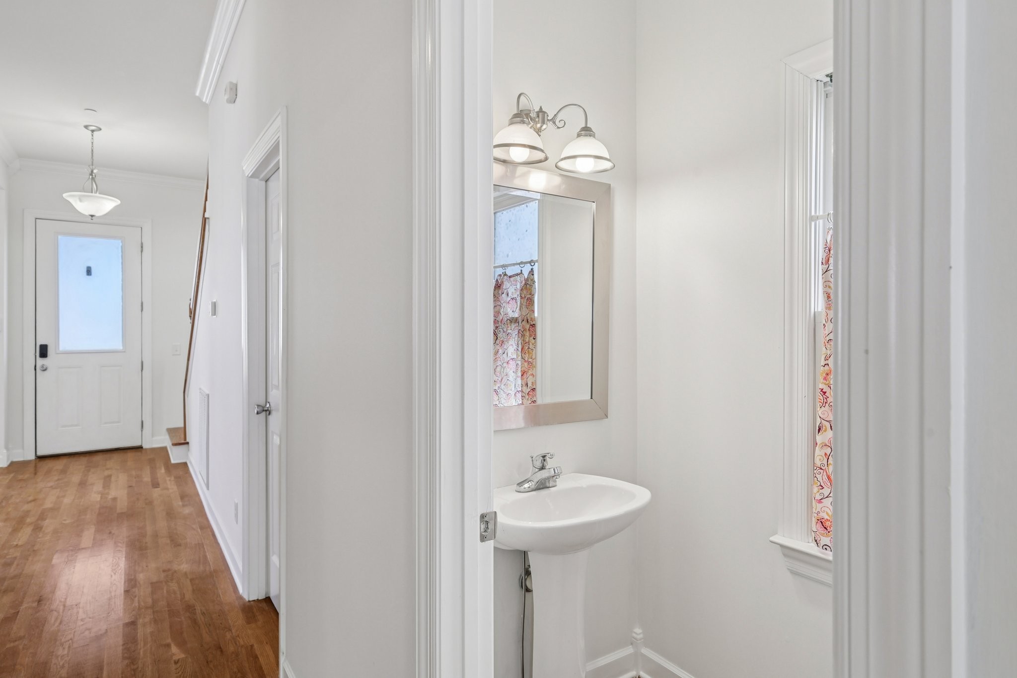 288 Augusta Avenue Pleasant View, TN 37146 - Photo 2 of 28 a bathroom with a sink a mirror and shower view