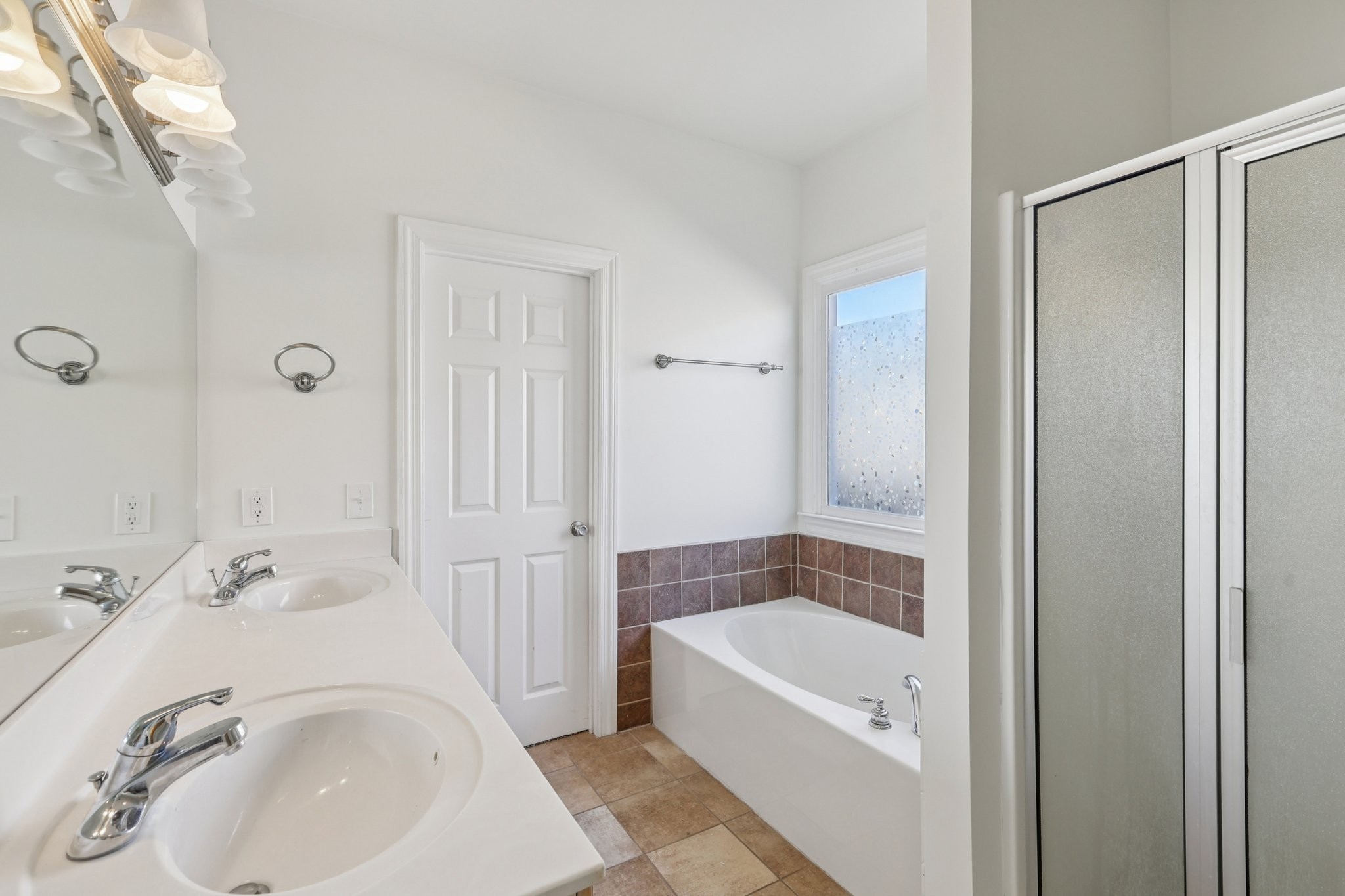 288 Augusta Avenue Pleasant View, TN 37146 - Photo 23 of 28 a bathroom with a tub sink and mirror