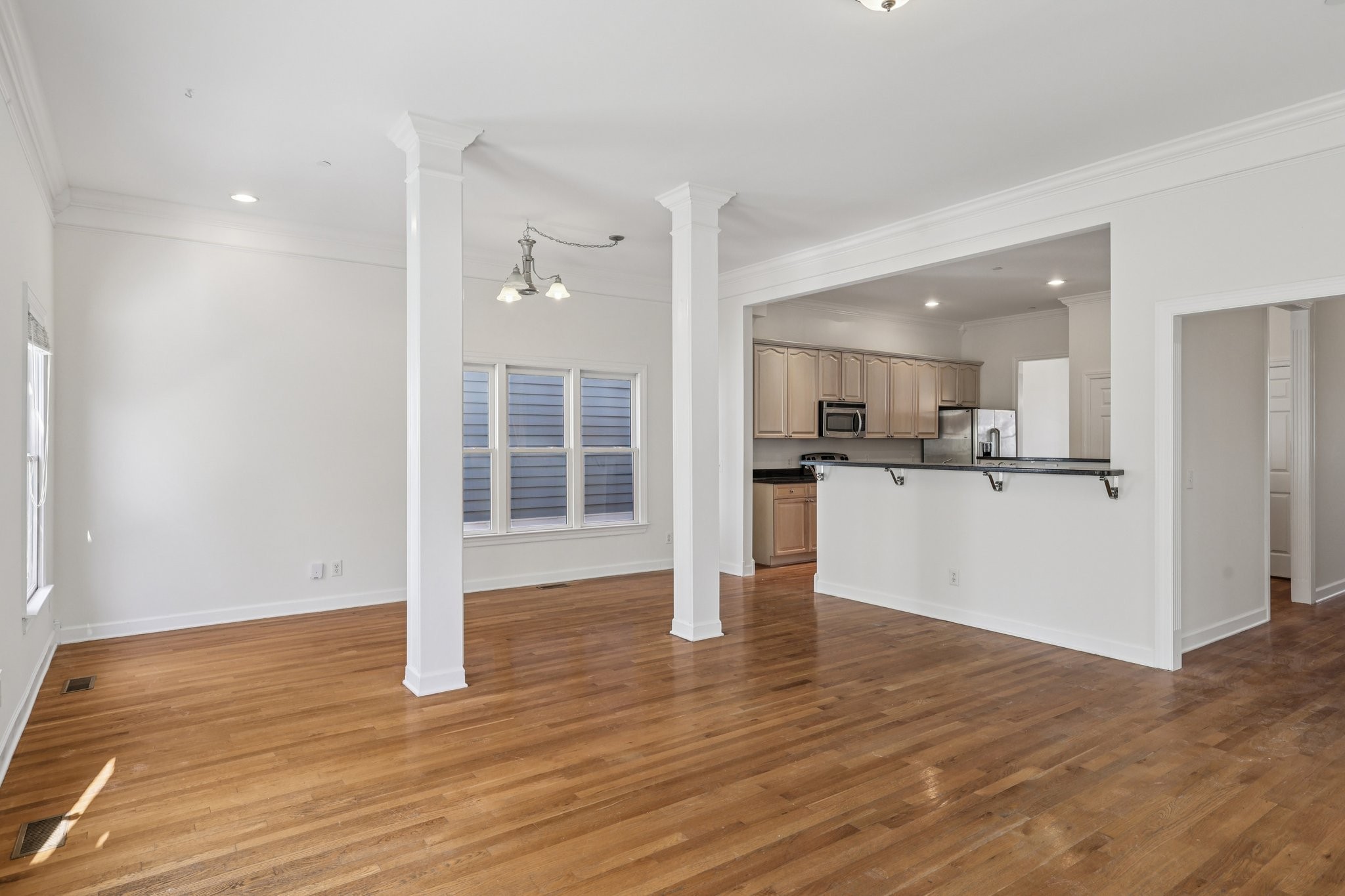 288 Augusta Avenue Pleasant View, TN 37146 - Photo 7 of 28 a view of a kitchen with wooden floor and a kitchen