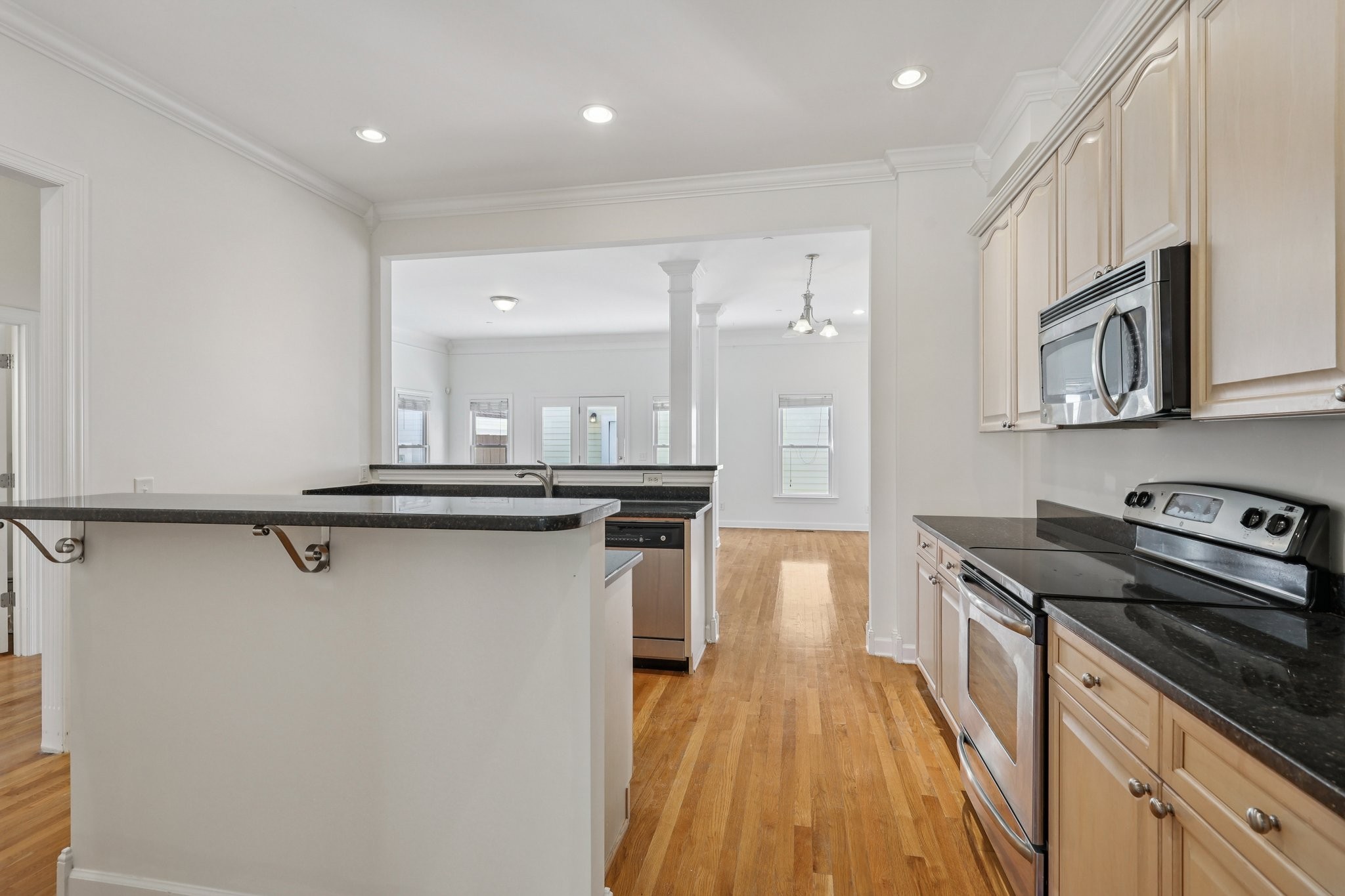 288 Augusta Avenue Pleasant View, TN 37146 - Photo 9 of 28 a kitchen with stainless steel appliances a sink stove and refrigerator