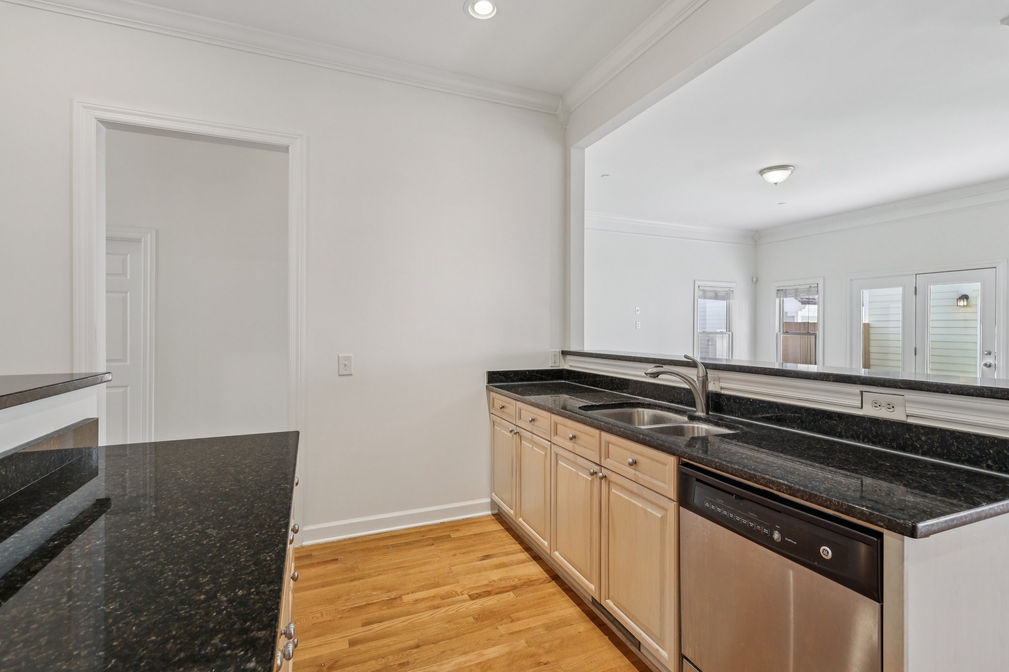 288 Augusta Avenue Pleasant View, TN 37146 - Photo 10 of 28 a kitchen with granite countertop cabinets a sink and dishwasher