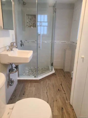 a bathroom with a sink and mirror