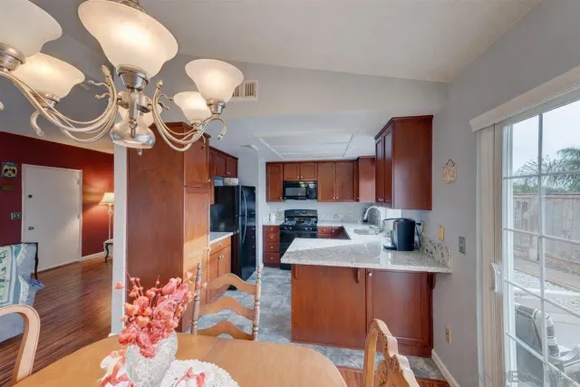 a bedroom with furniture and a book shelf