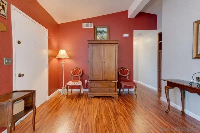 a view of a backyard with furniture and a fire pit