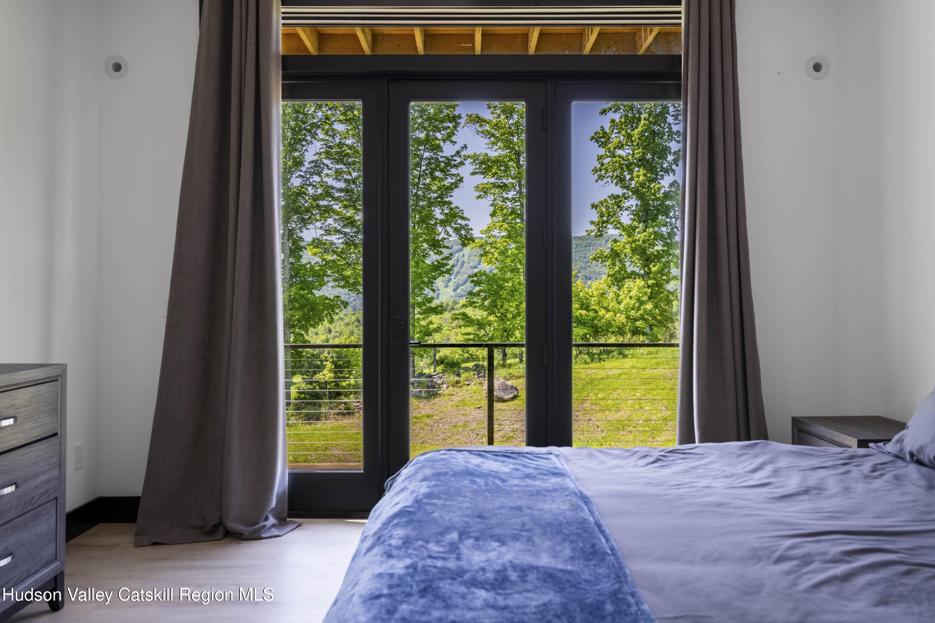 4 Goff Road Windham, NY 12496 - Photo 14 of 68 a bedroom with a bed and a window