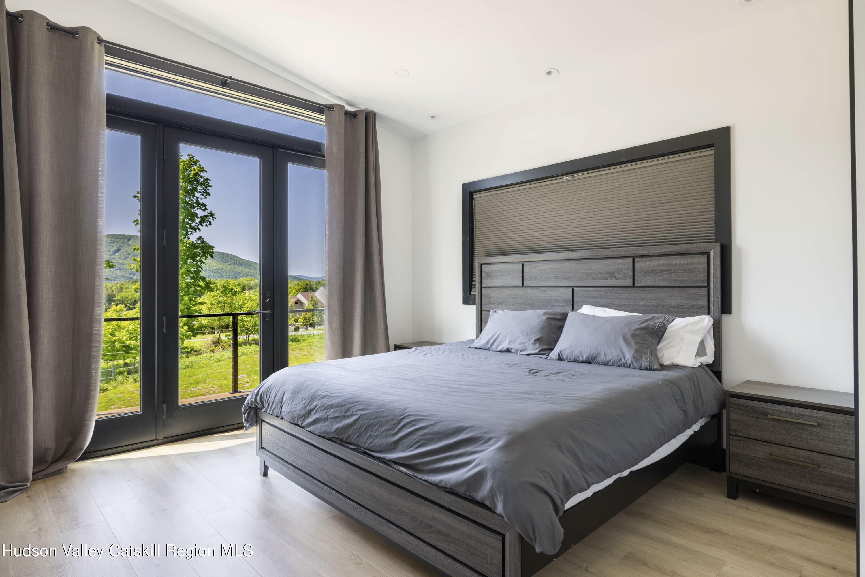 4 Goff Road Windham, NY 12496 - Photo 24 of 68 a bedroom with a bed and window