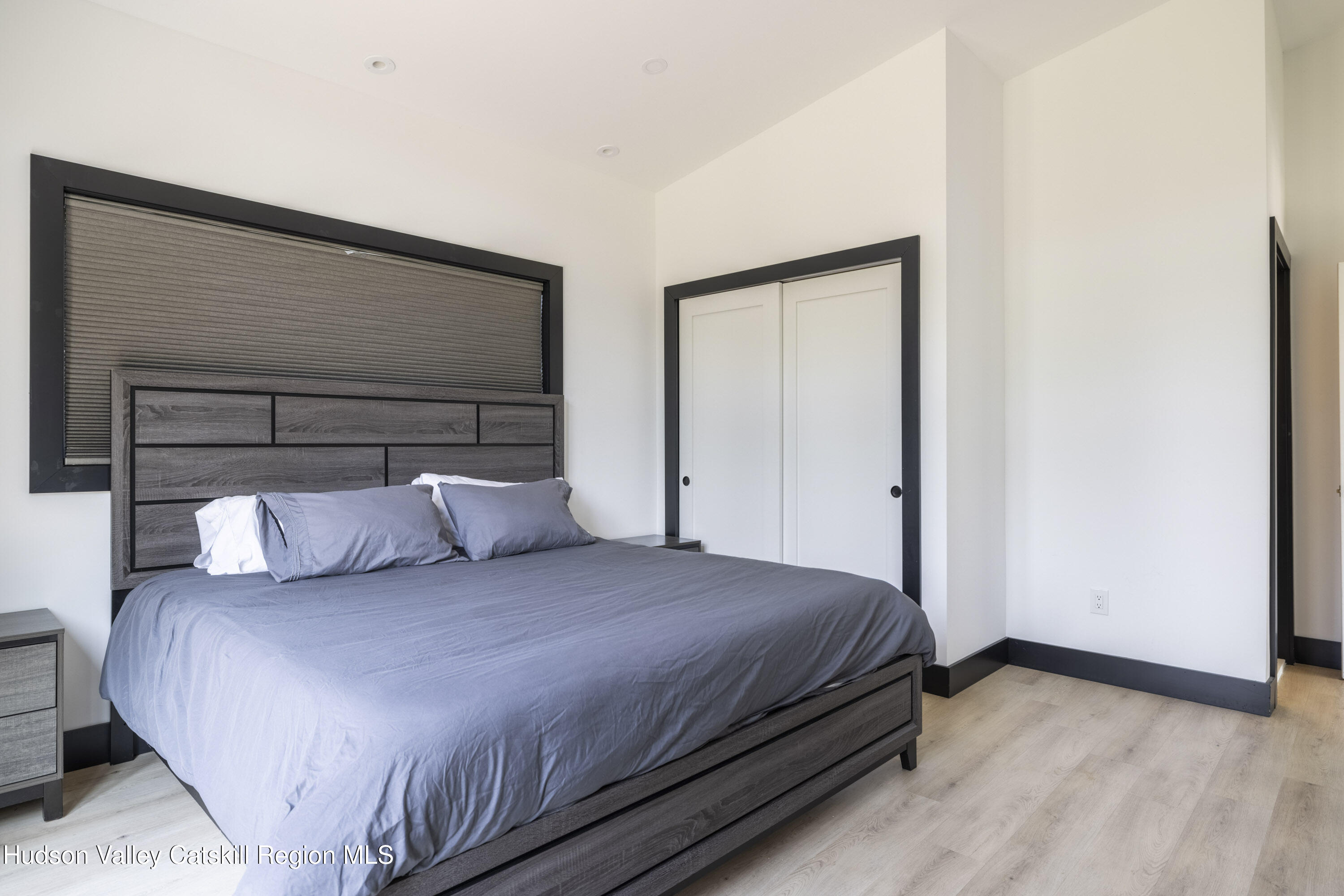 4 Goff Road Windham, NY 12496 - Photo 27 of 68 a bedroom with a bed and a cabinets