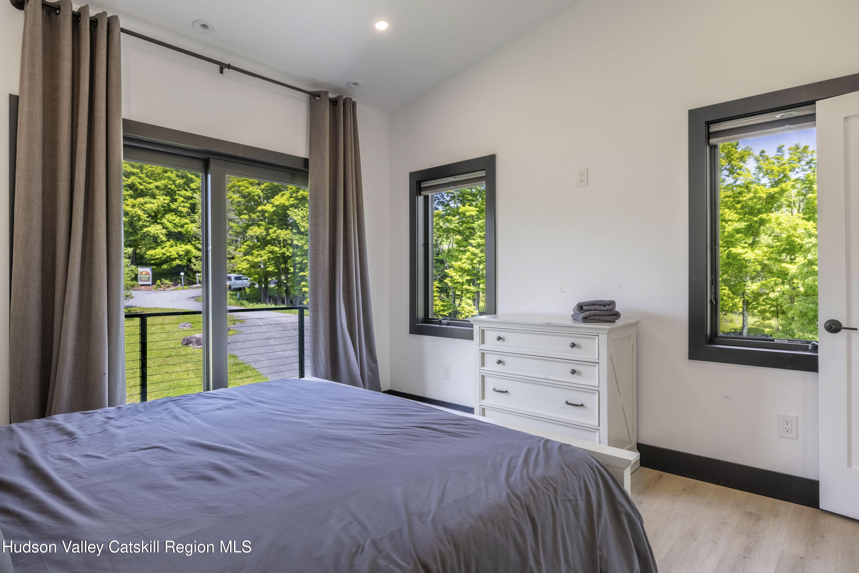 4 Goff Road Windham, NY 12496 - Photo 31 of 68 a bedroom with a bed and a window