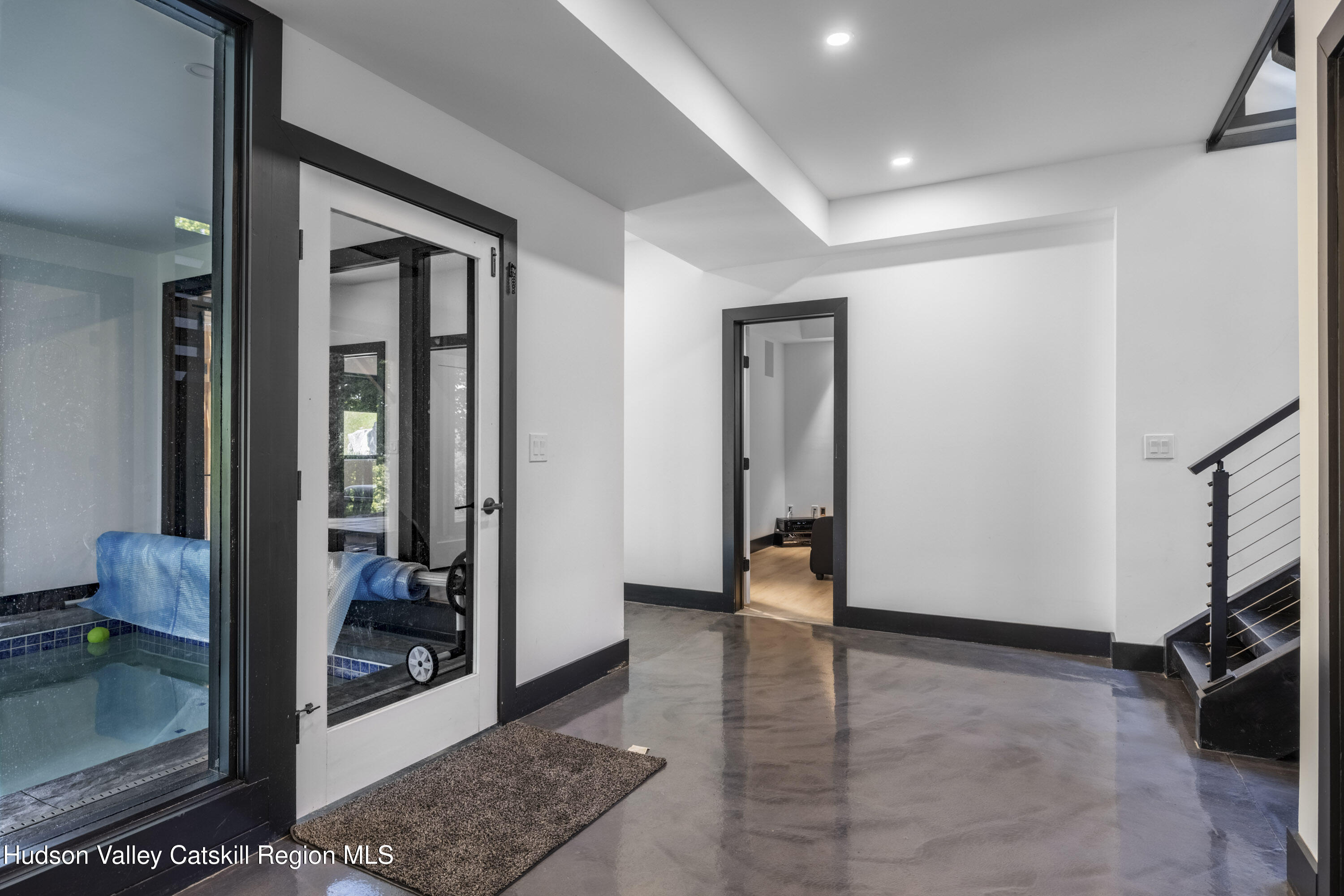 4 Goff Road Windham, NY 12496 - Photo 36 of 68 a view of a hallway with bathroom and a glass door shower