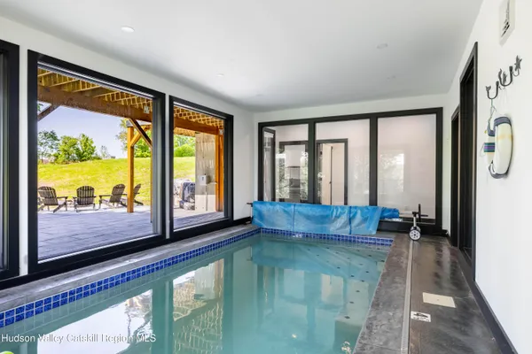 a view of a balcony with wooden floor
