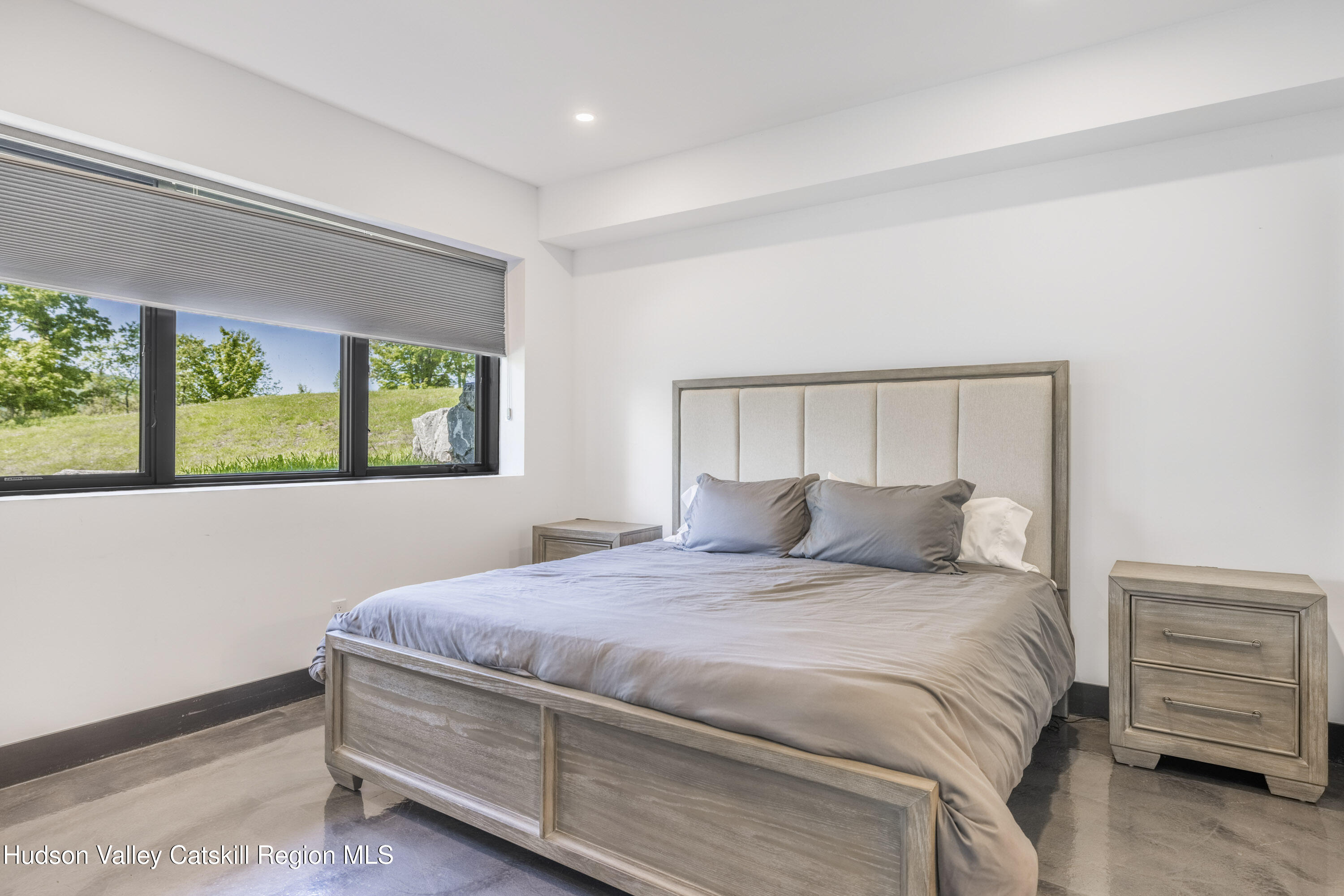 4 Goff Road Windham, NY 12496 - Photo 39 of 68 a bedroom with a bed and a window