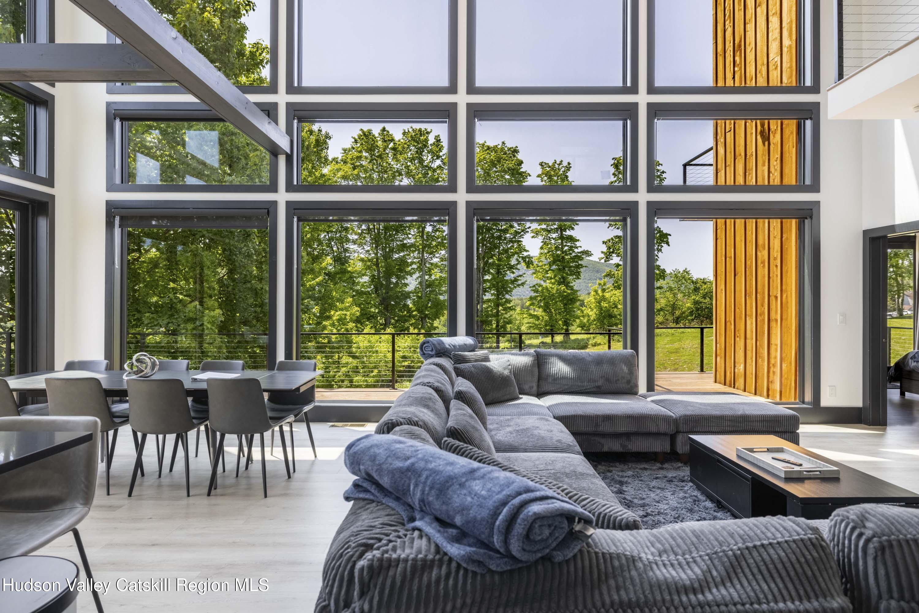 4 Goff Road Windham, NY 12496 - Photo 4 of 68 a living room with furniture and a window