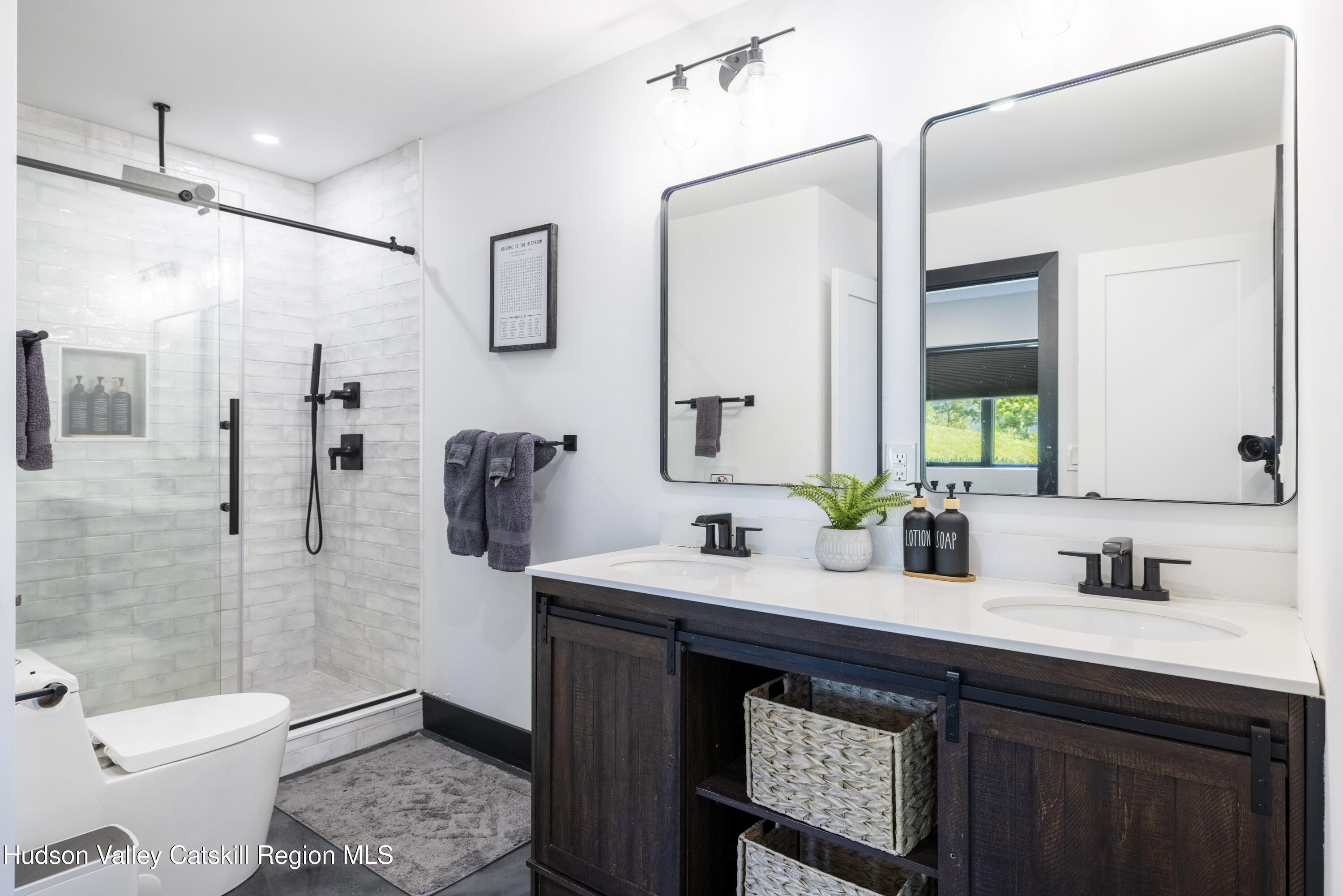 4 Goff Road Windham, NY 12496 - Photo 42 of 68 a bathroom with a sink a toilet and shower