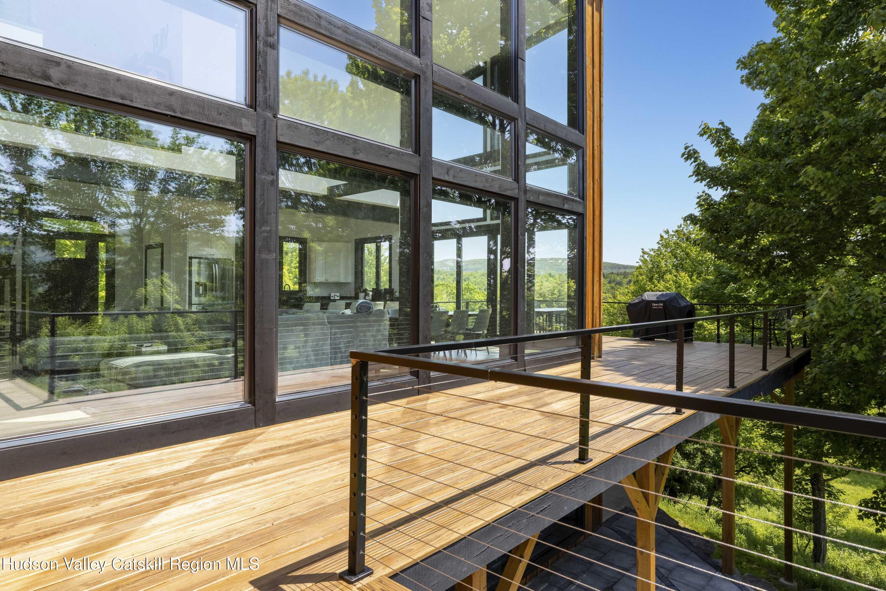 4 Goff Road Windham, NY 12496 - Photo 48 of 68 a view of a balcony with wooden floor