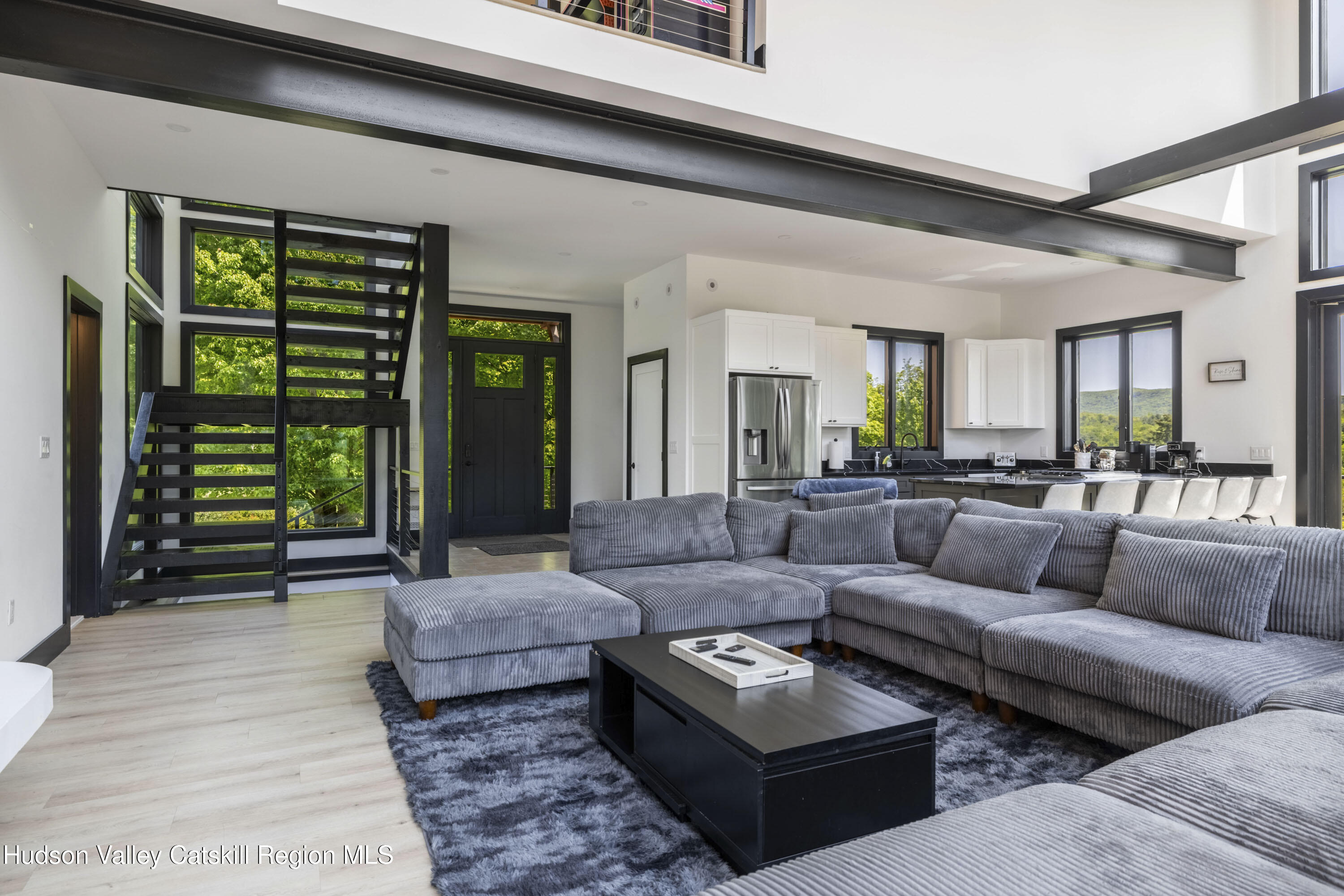 4 Goff Road Windham, NY 12496 - Photo 5 of 68 a living room with furniture and a large window