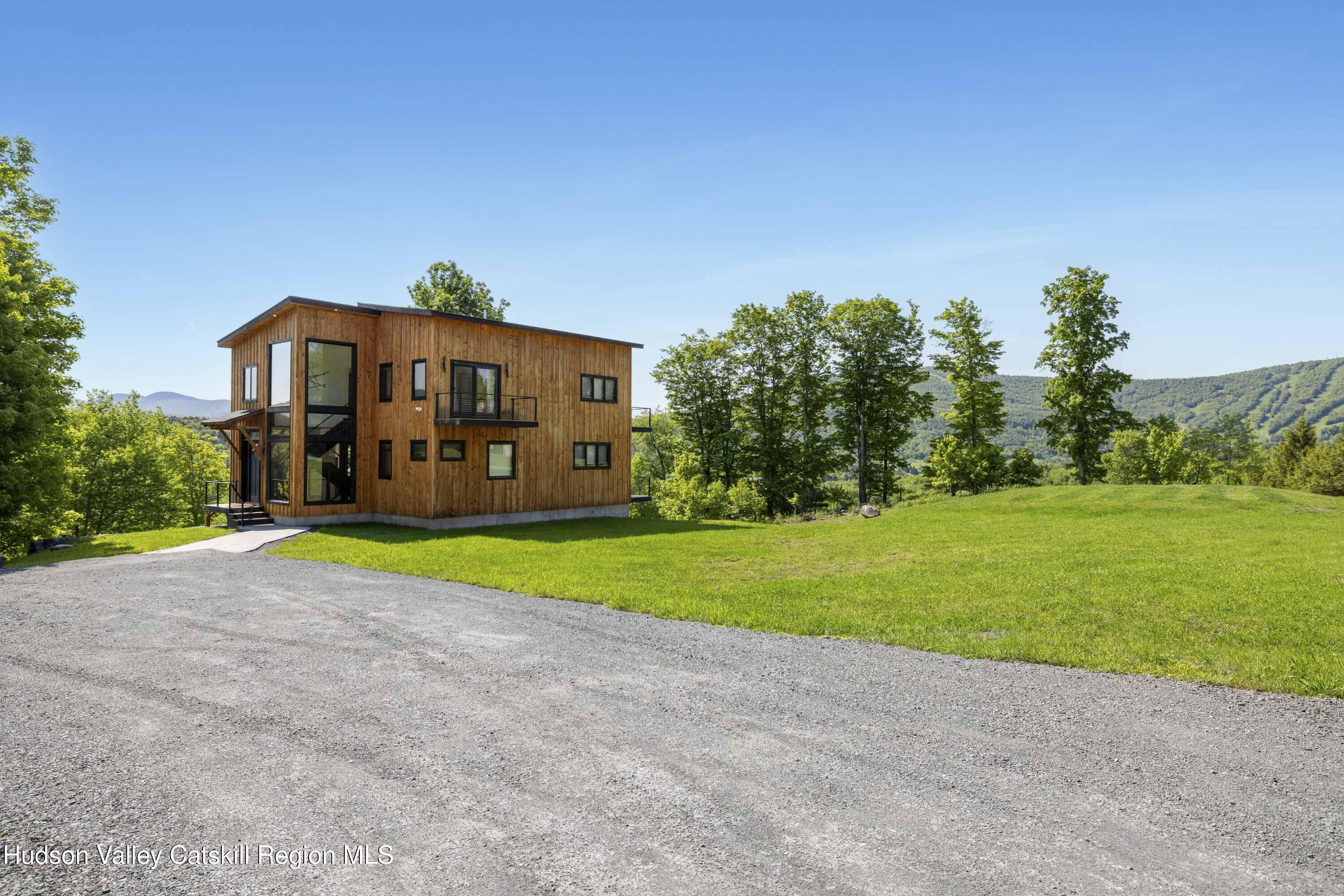4 Goff Road Windham, NY 12496 - Photo 54 of 68 a view of a house with a yard