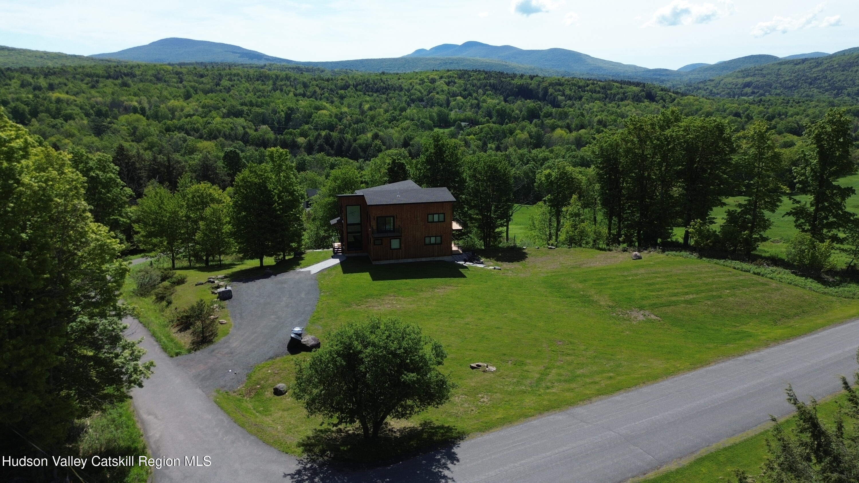 4 Goff Road Windham, NY 12496 - Photo 61 of 68 a green field with lots of trees in the background