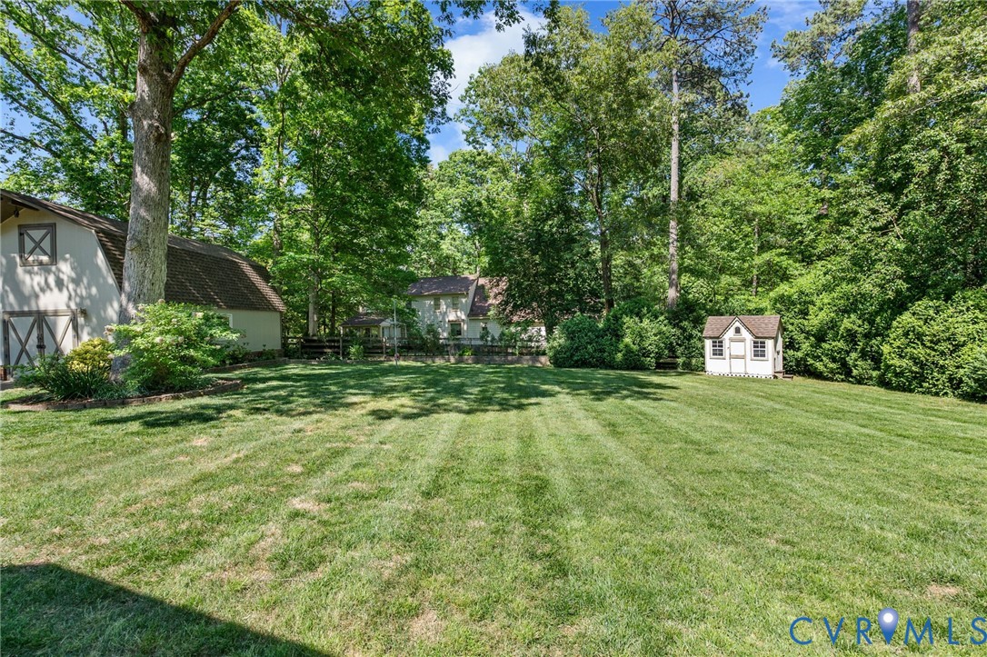 5700 Elfinwood Road Chester, VA 23831 - Photo 38 of 38 a big yard with lots of green space and plants