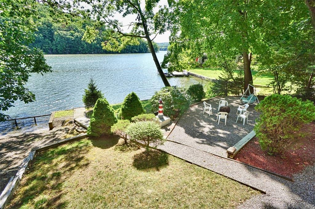 a view of a garden with an outdoor space