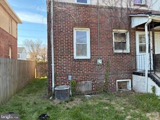 273 Broad Street Carneys Point, NJ 08069 - Photo 3 of 14 a brick building with a bench in front of it